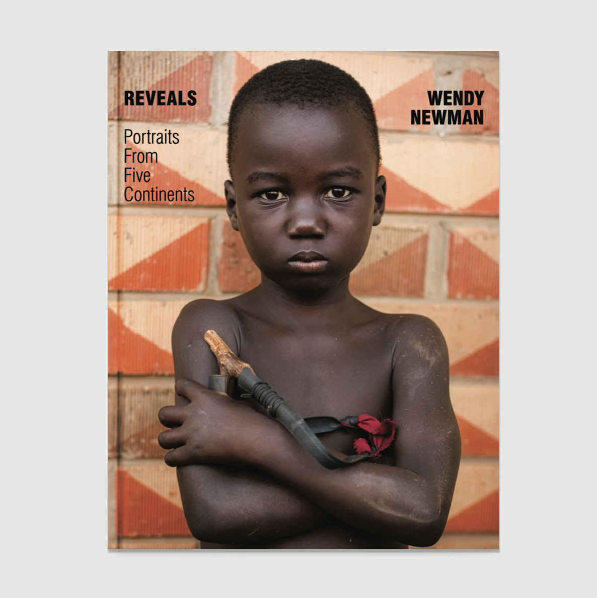 Reveals: Portraits from Five Continents