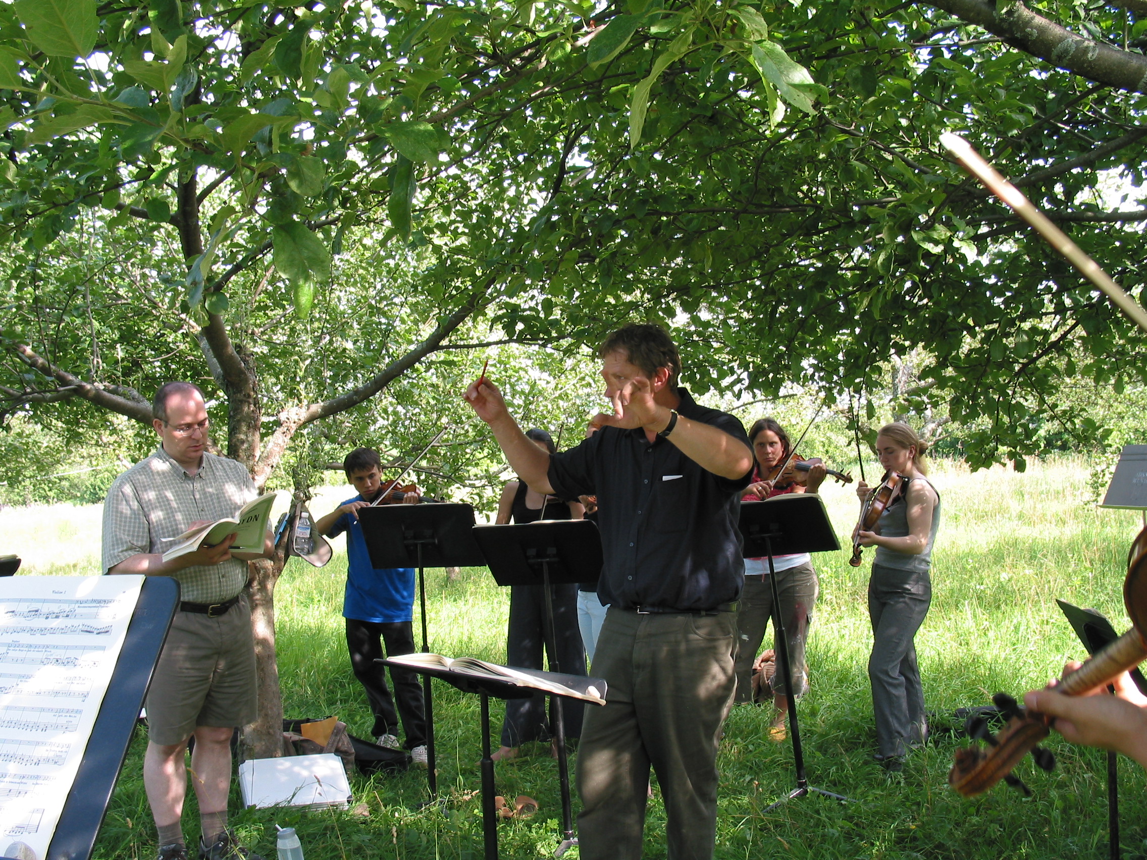 Michael and Musicians in Orchard.jpg