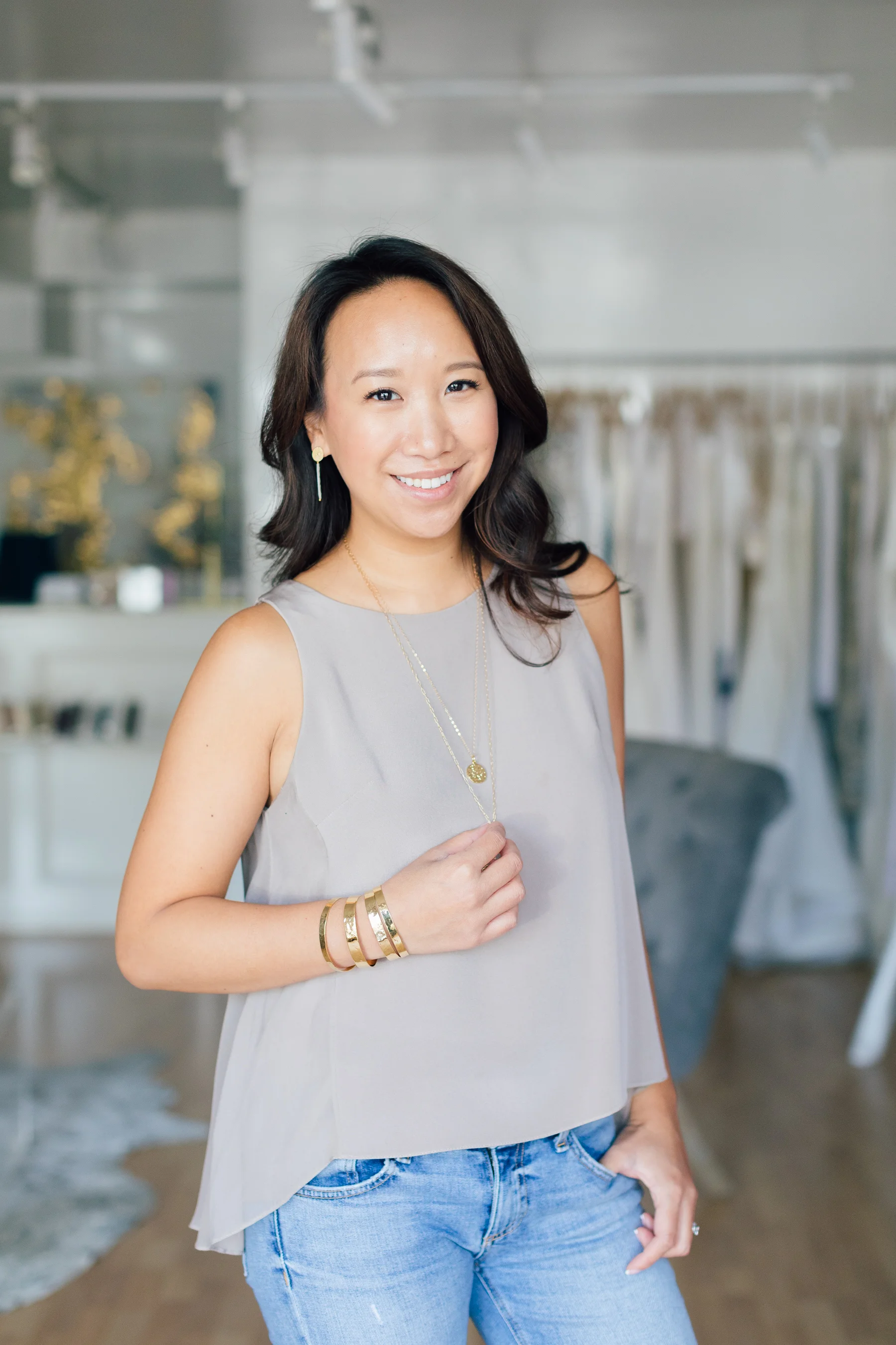 The Julie Top can be made in over 300 colors, but we love it in a simple taupe paired with Andrea Del Bello Spanish Coin Necklaces and Gold Hammered cuffs, all available at the Boutique.