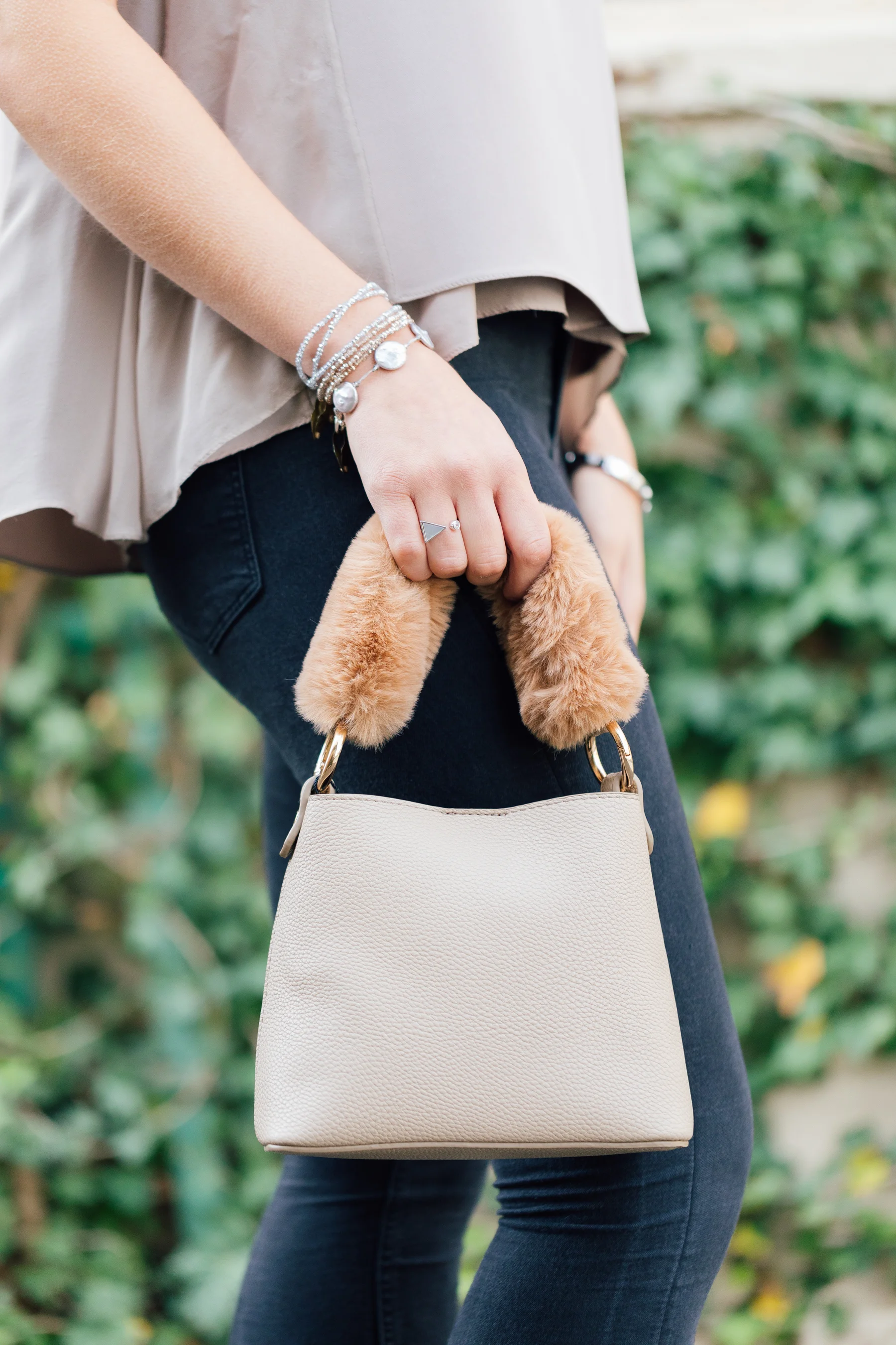 Un Billion's new Isabella bag--the fur handle is too much fun!--paired with Nyla Star's new Jo ring, and Pebbles by LLF stackables in the perfect colors for the upcoming holiday season.