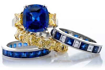 Cushion_Cut_Sapphire_and_Fancy_Yellow_Trapeziod_Engagement_Ring_w_Bands_400x.jpg