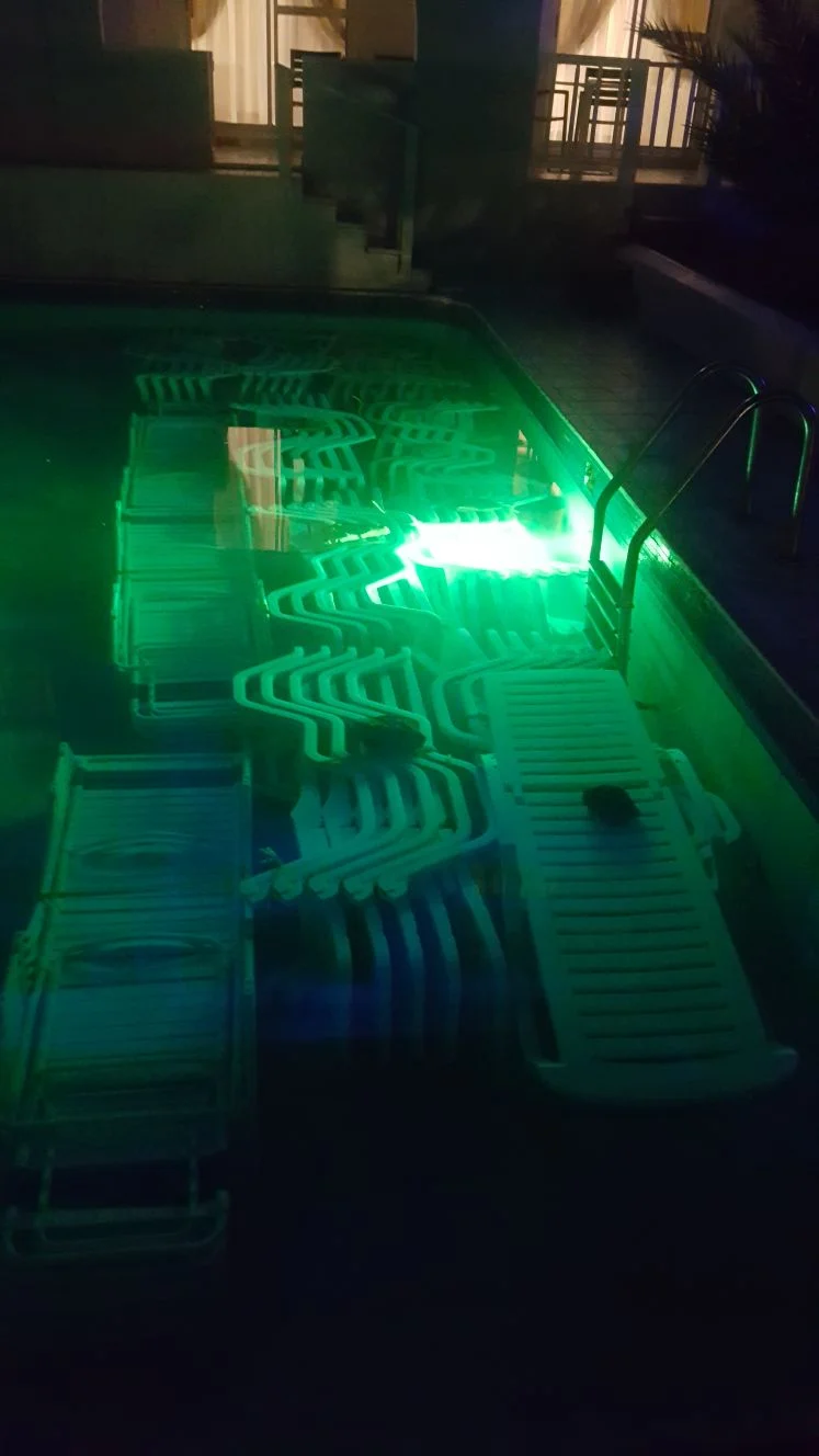 Chairs in the pool