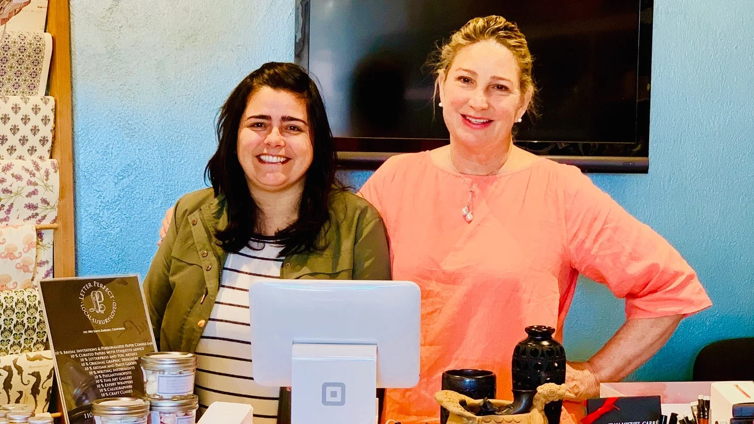 Leslie Person, owner (right) with staff member