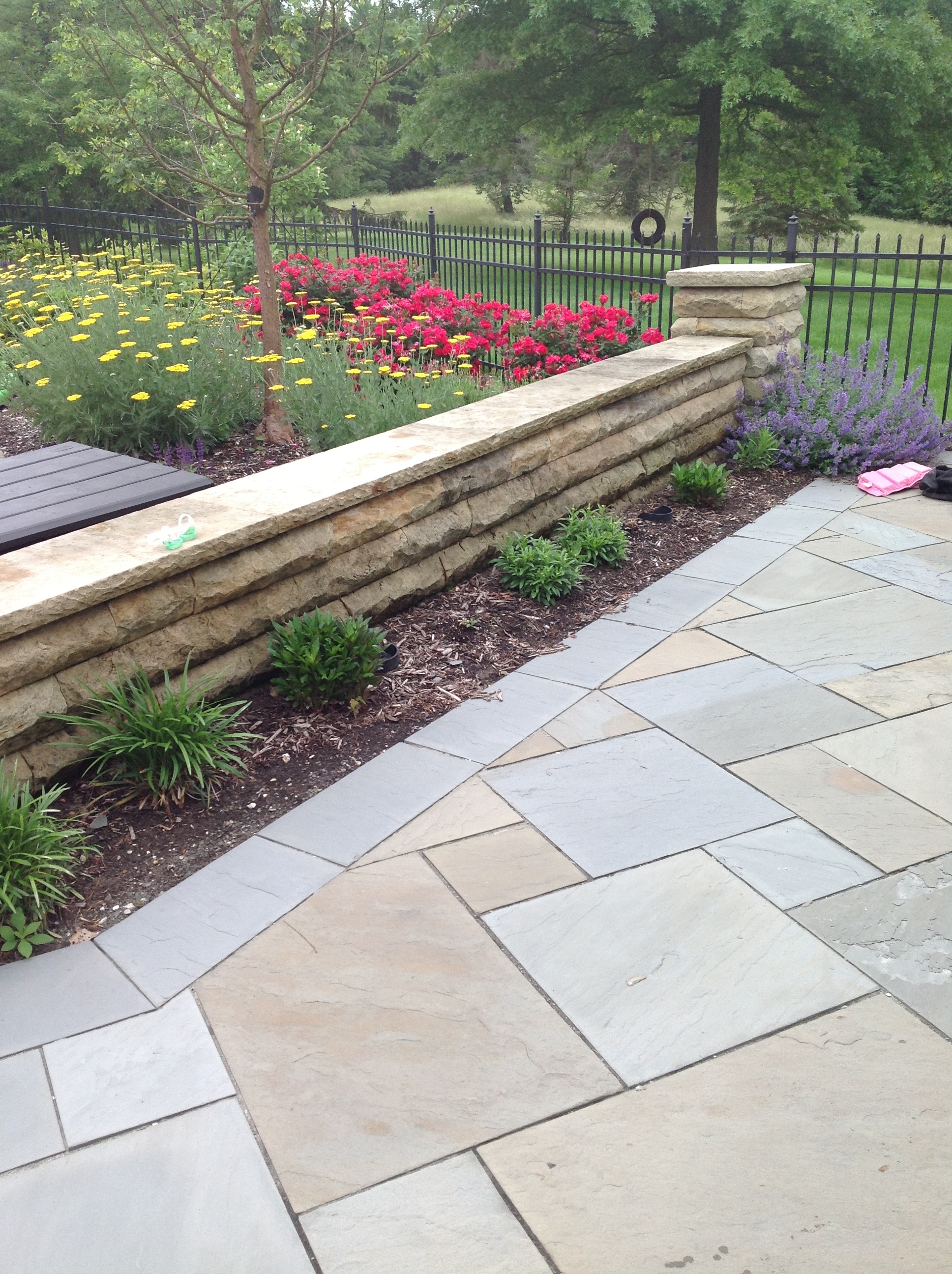 Patio pavers and retaning wall authorized by Unilock Hudson OH
