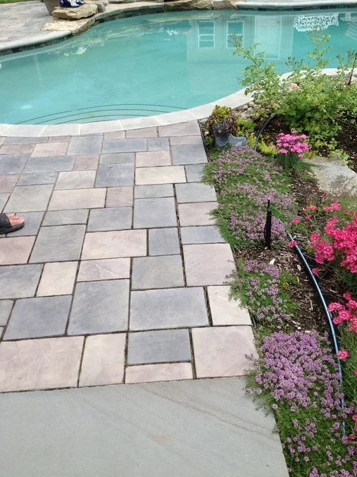 How a Lawn Care Team Enhances Your Landscape Design in the Hudson, OH Area