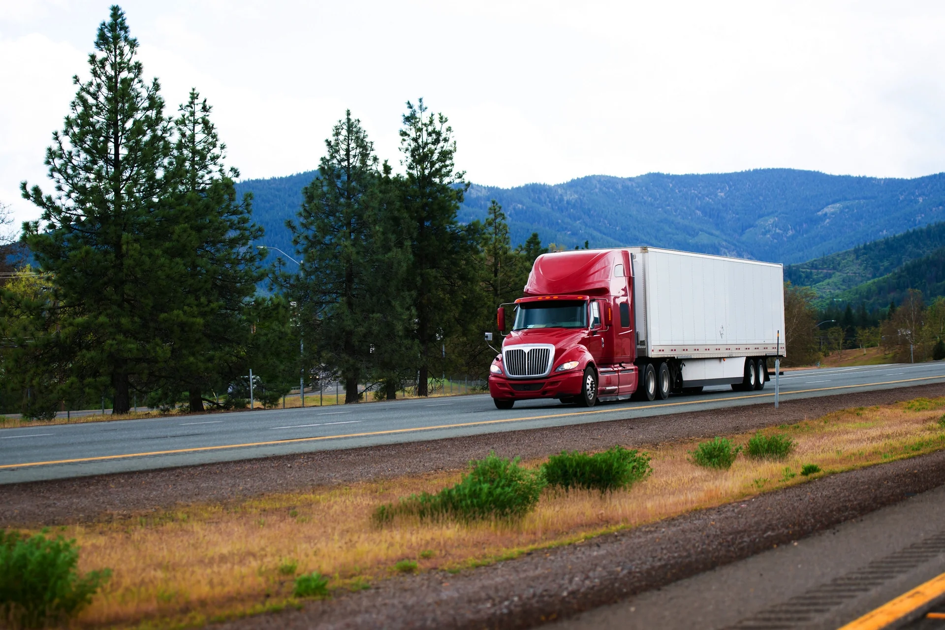 red truck driving.jpeg