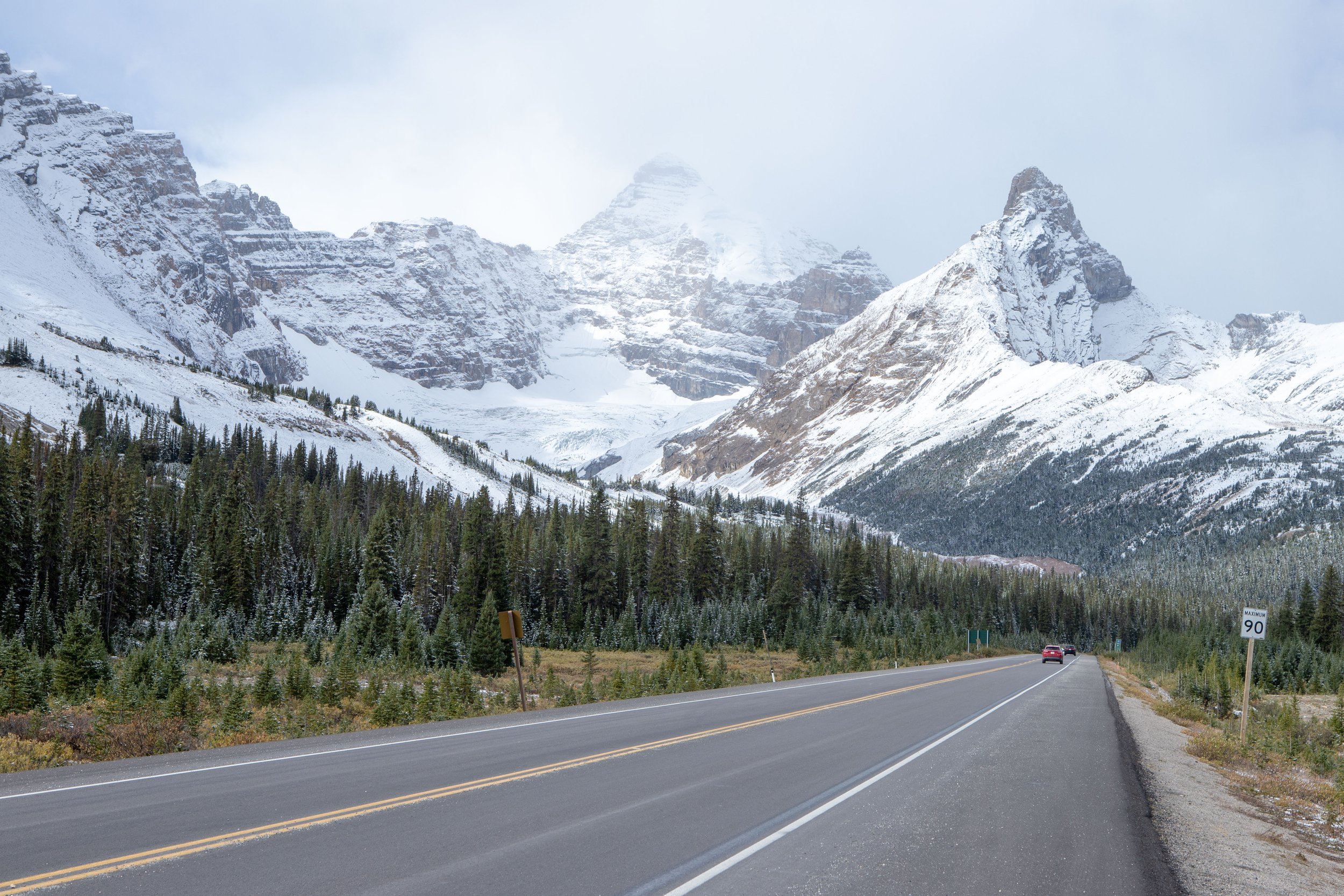 A roadside view of the Canadian Rockies in Alberta or British Columbia.