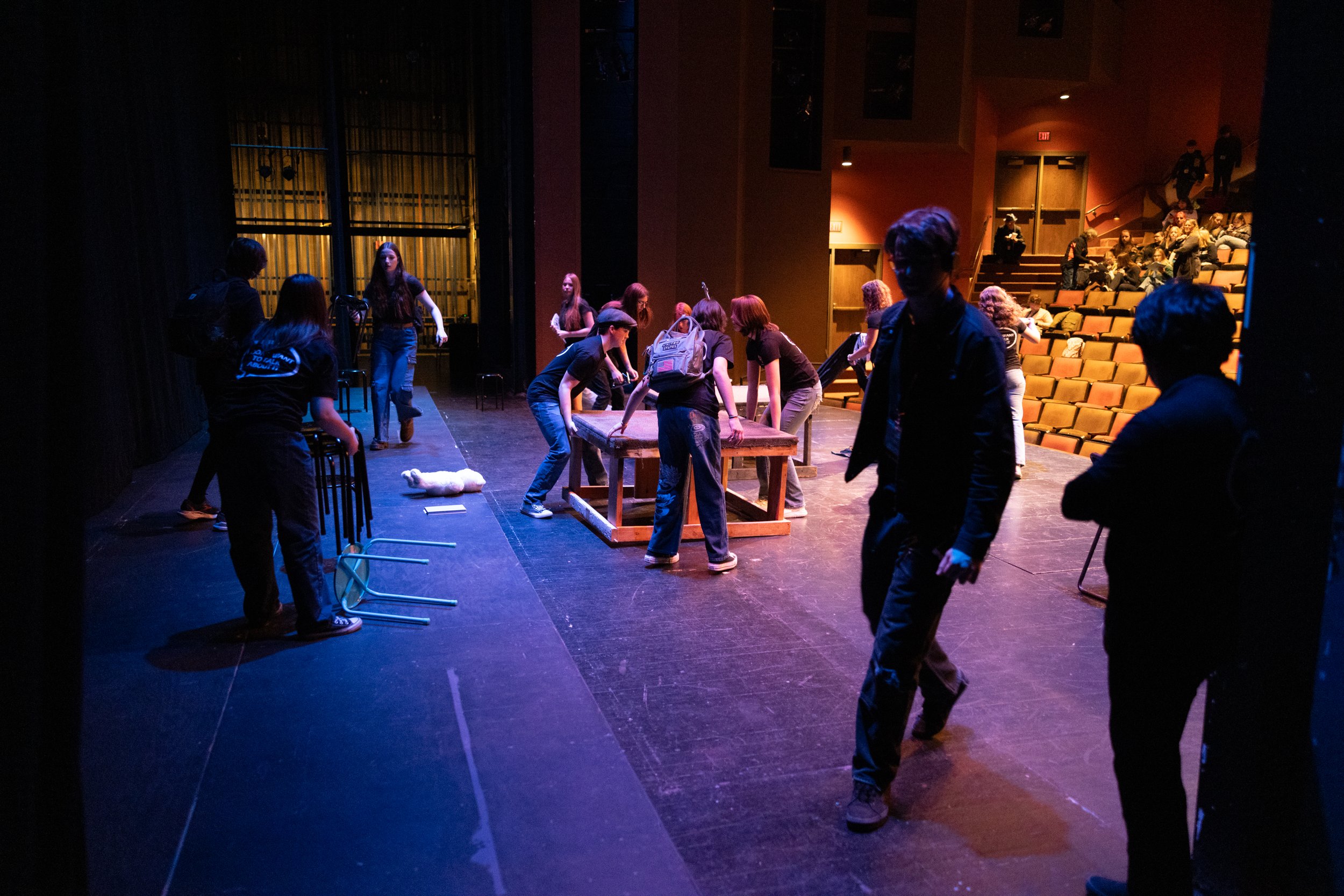Whitehall High School students prepare the stage for their performance of “I Don’t Want to Talk About it” at the State Thespian Festival on Friday, January 24, 2025. Whitehall High School blocked the performance of the play, despite months of rehear
