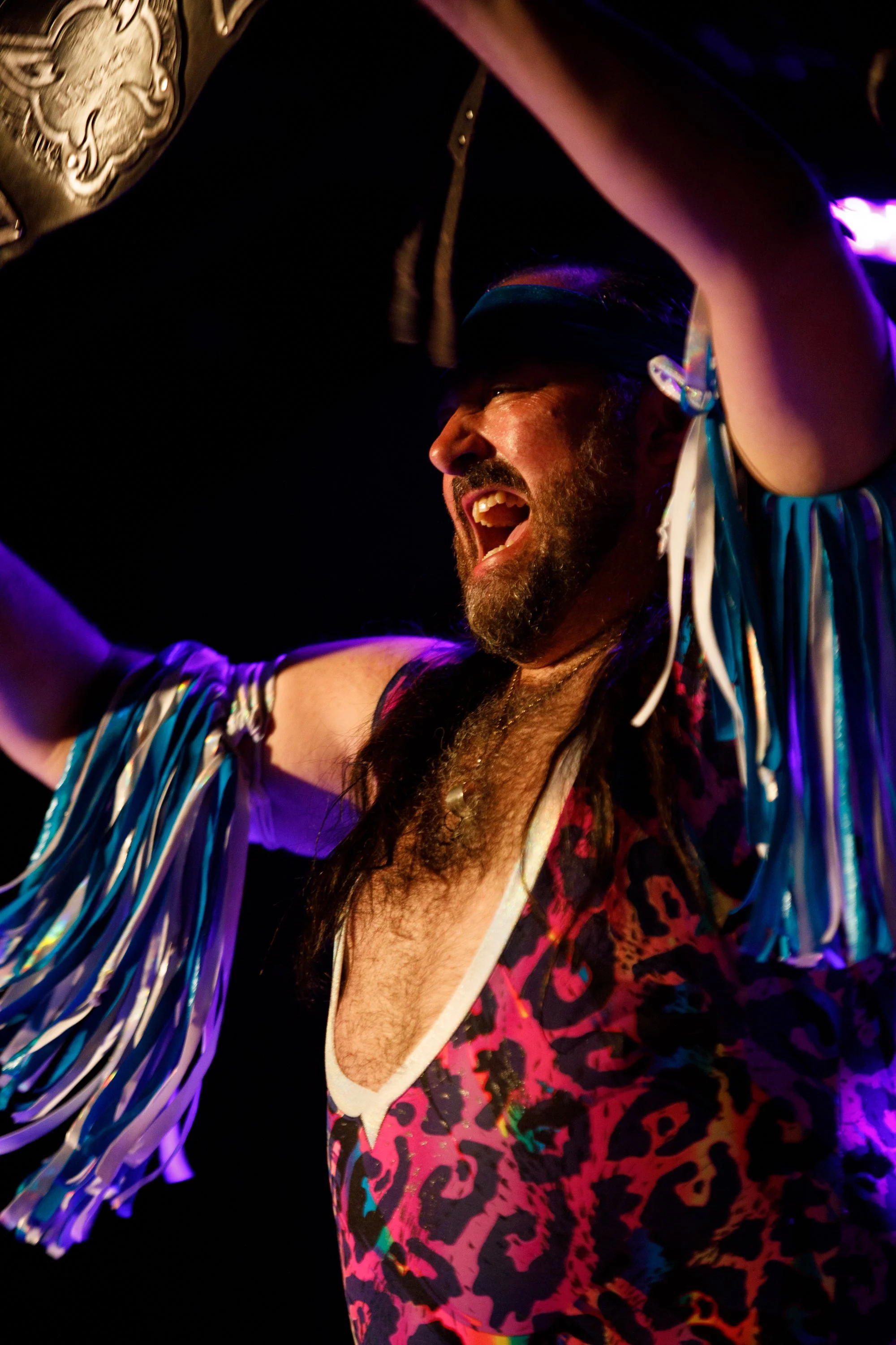 The Tassels of Terror celebrate their victory over the Pair of Hearts during Montana Drag Wrestling at the Zootown Arts Community Center in Missoula, Montana on Saturday, June 7, 2025.