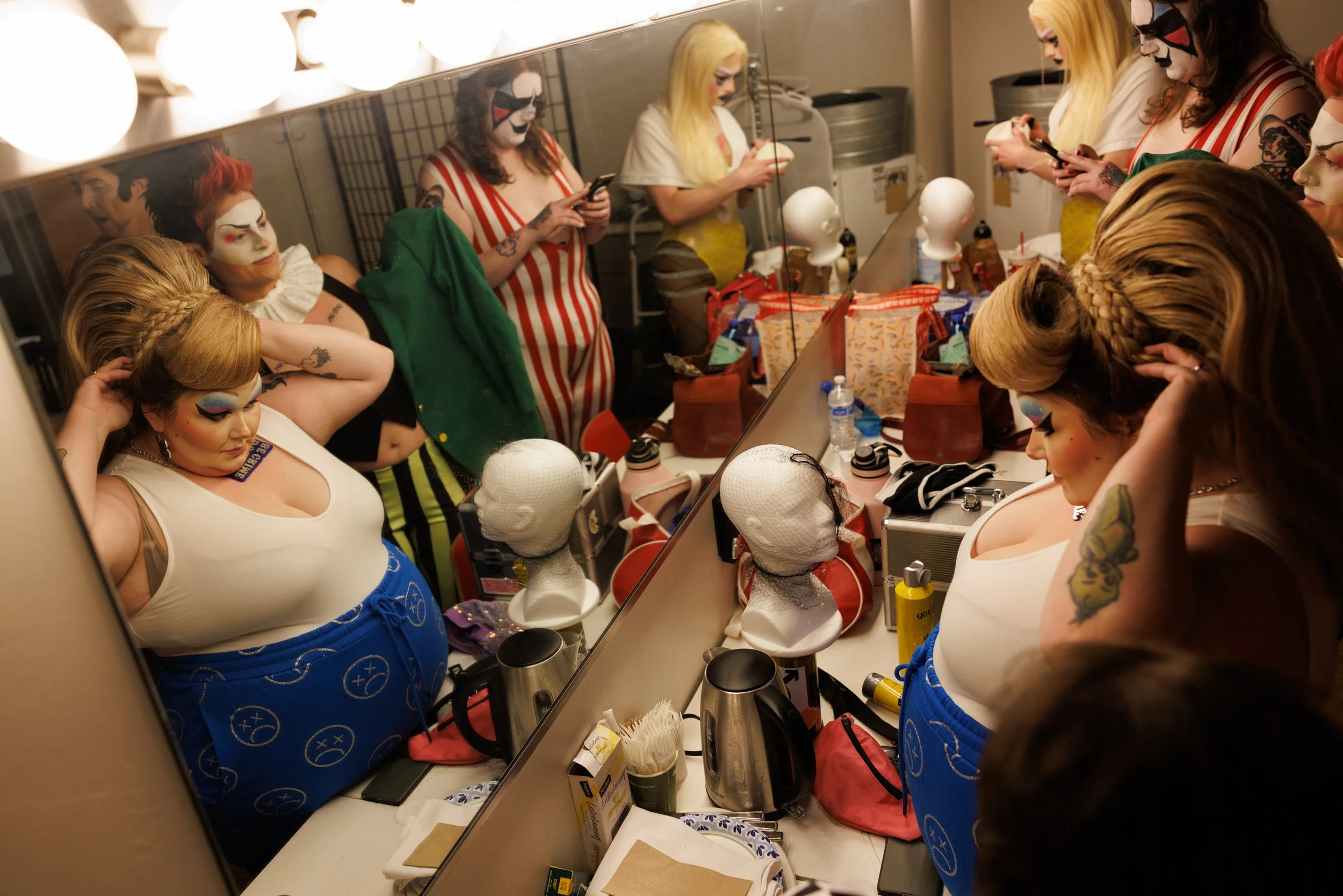 Drag artists Eunice Sexx, Bironic, Iris Von Moxxii, and Stella Kinesis prepare for the Montana Drag Wrestling show at the Zootown Arts Community Center in Missoula, Montana on Saturday, June 7, 2025.