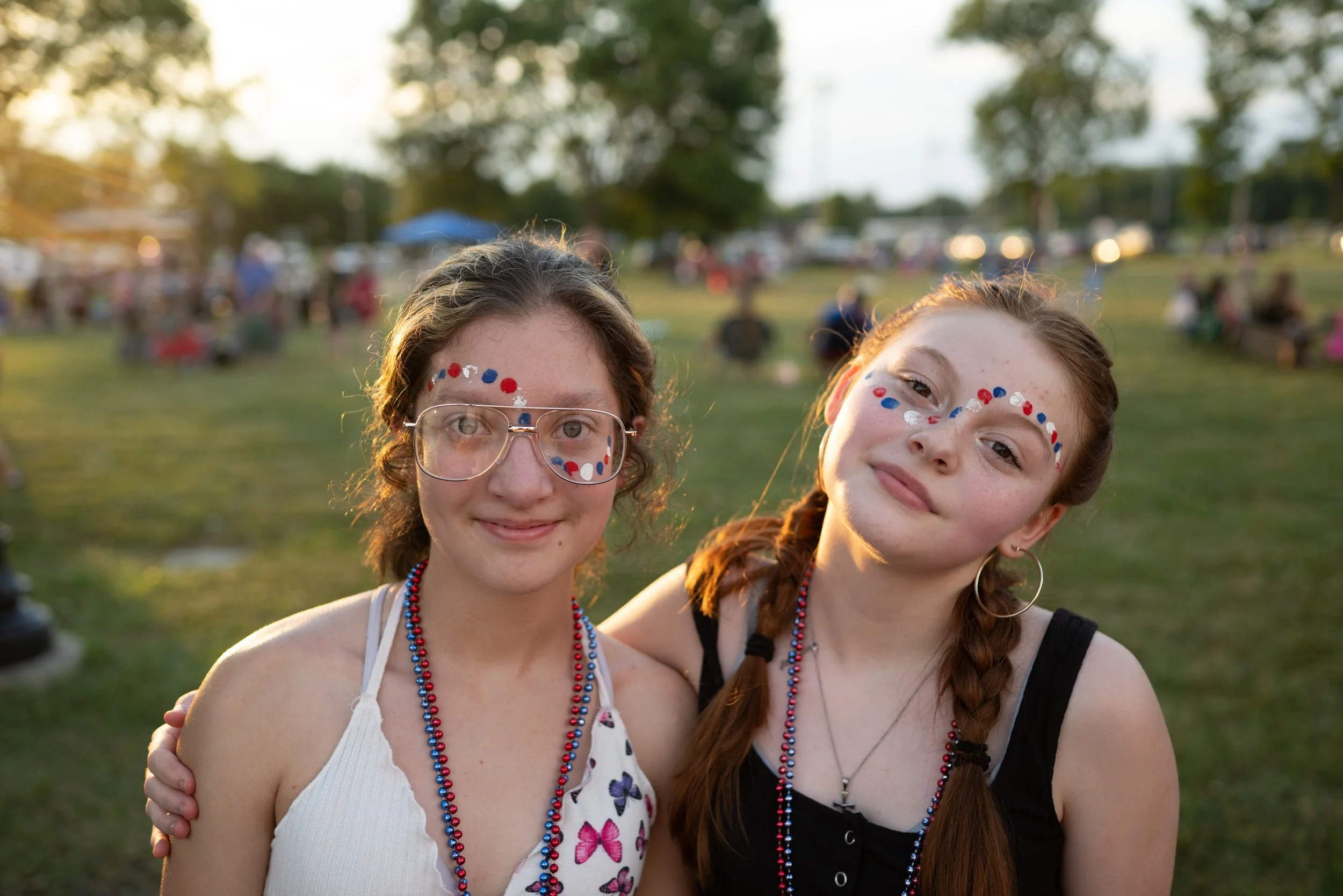 Jamie Fugate, 13, and Chey Spates, 16, painted their faces for a Fourth of July celebration at Flat Run’s Veterans Park on Saturday, June 29, 2024.