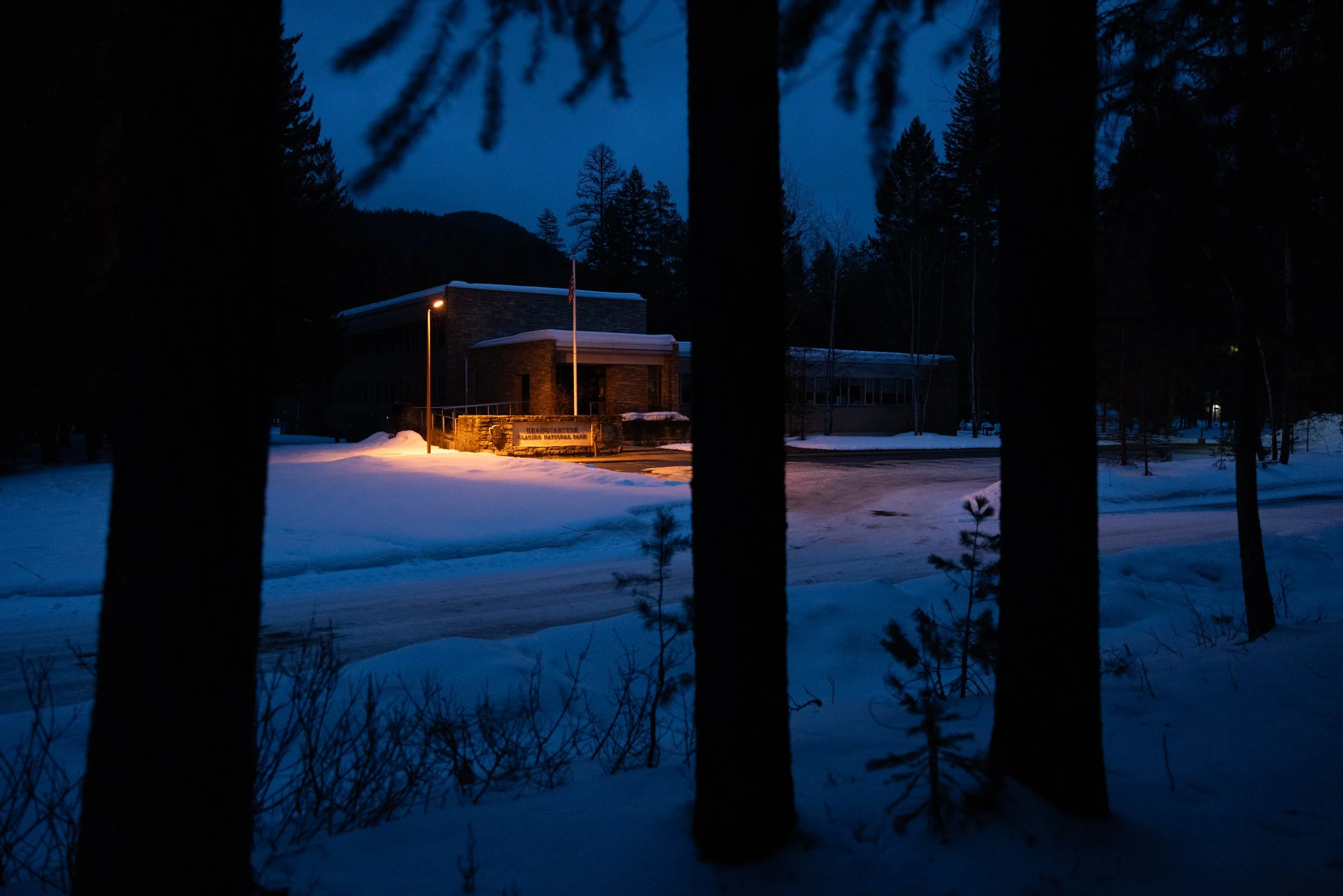 Night falls on the headquarters of Glacier National Park on Saturday, February 22, 2025. Although recent federal layoffs have impacted National Park Service personnel across the country, Glacier National Park remains largely unscathed.
