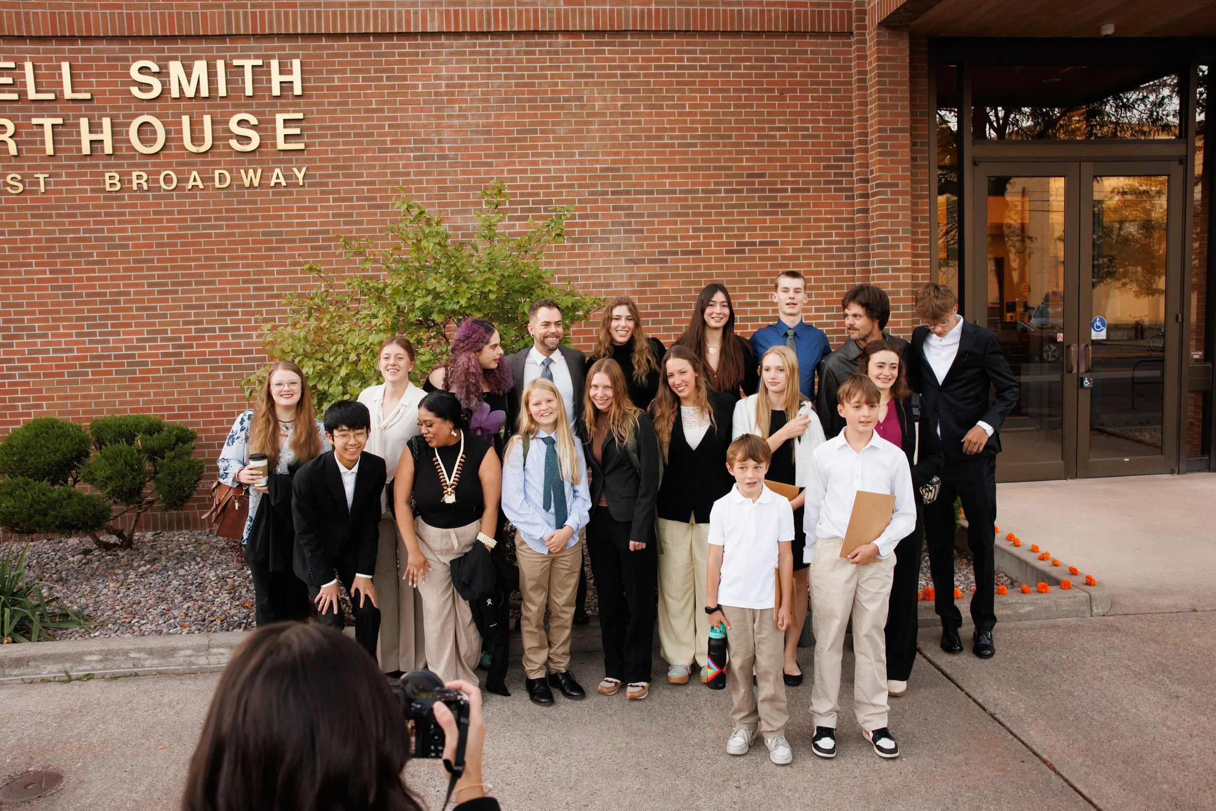 The youth plaintiffs before the second day of the Lighthiser v. Trump hearing at the Russell Smith Courthouse in Missoula, Montana on Wednesday, September 17, 2025. 
