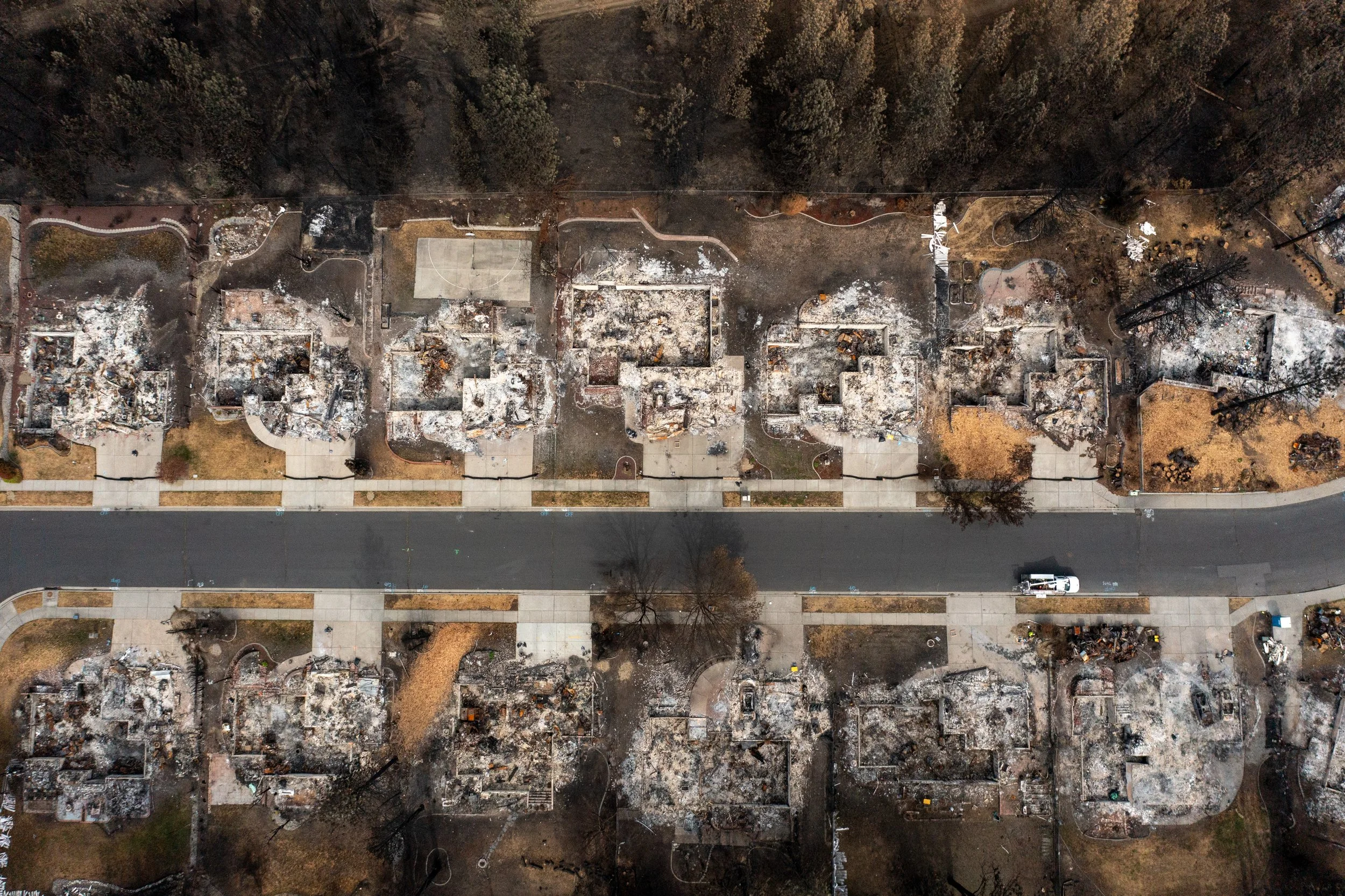 The Old Trail wildfire, which occurred in August,  leveled hundreds of homes in Spokane, Wash. "That is a war zone," said Maj. Gen. Gent Welsh of the Washington National Guard. This aerial image was taken a little over a month later on Sept. 9, 2026.