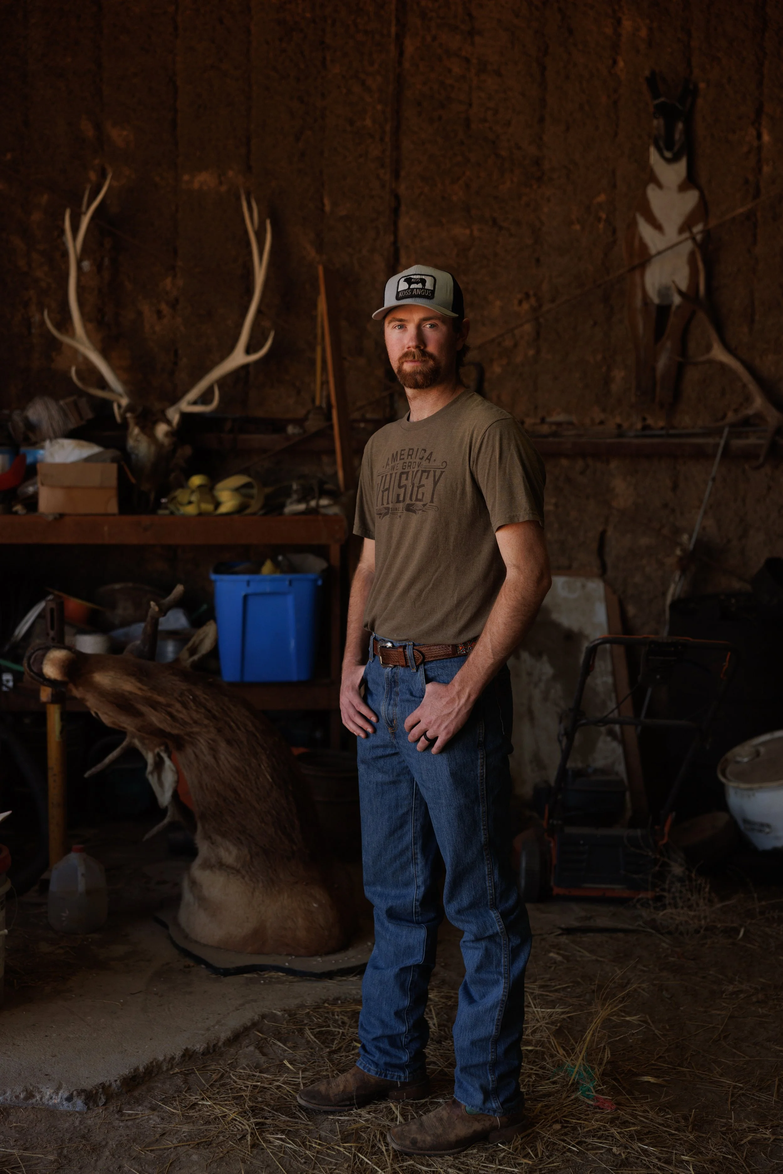 Kendall Koss, 26, poses for a portrait on his ranch south of Malta, Montana, on Friday, May 1, 2026. Koss, along with his wife Iris and three kids, raises black Angus cattle and seed stock bulls. He leases land from American Prairie and shares a bord
