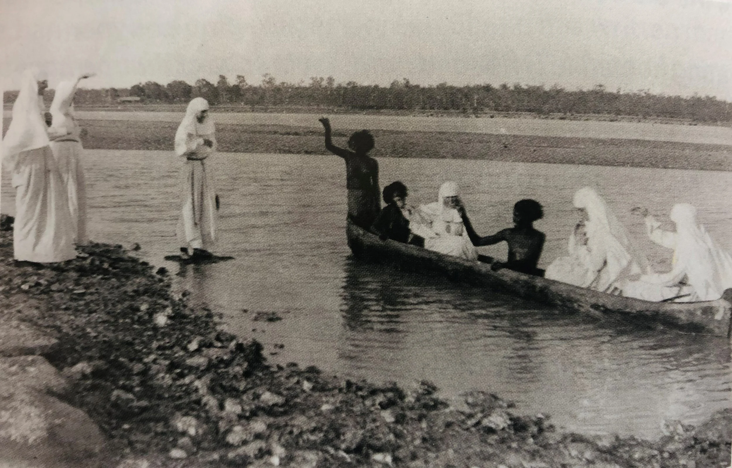 Sisters in canoe 2.jpg