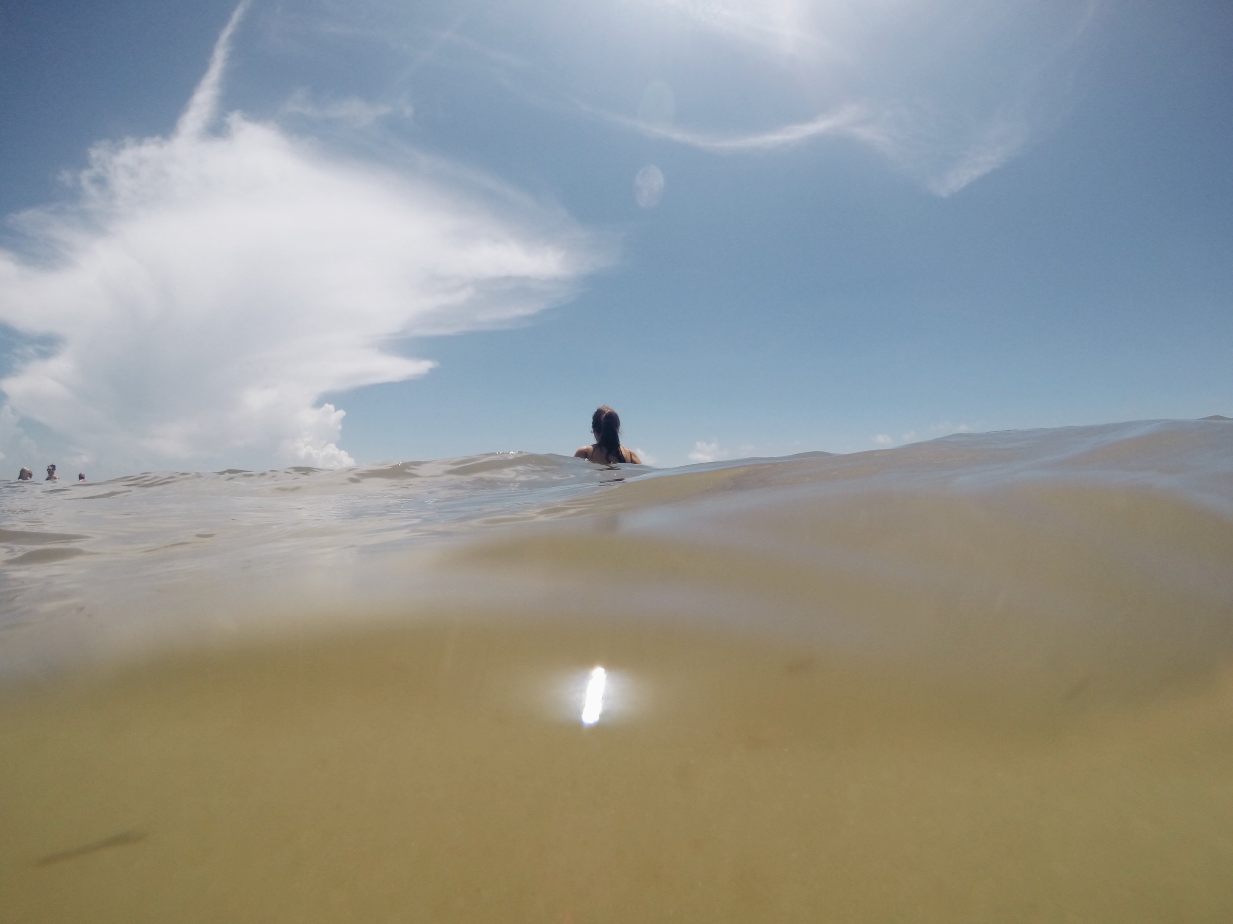 girloceanbeachwavescancunmexico