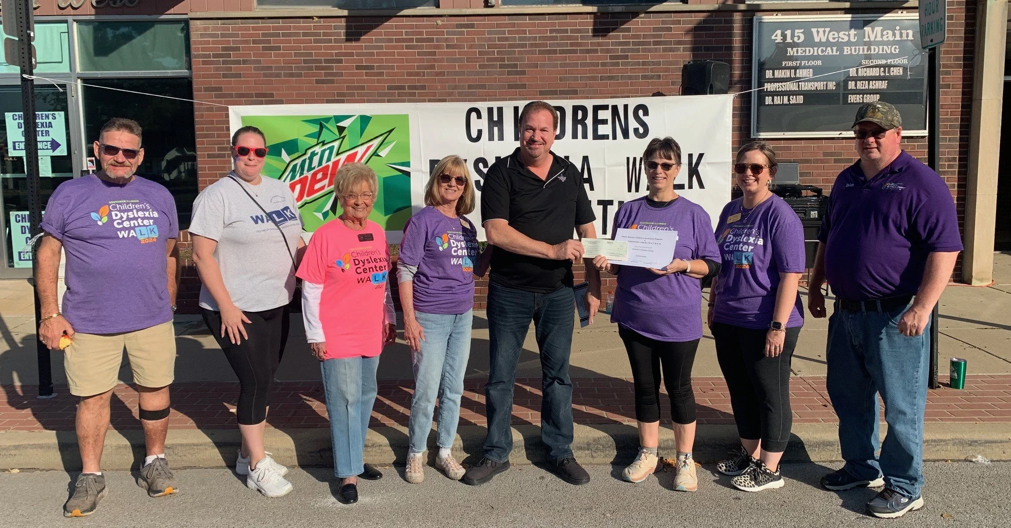 IMCAP YOC Matching Grant Check Presentation to Children's Dyslexia Center