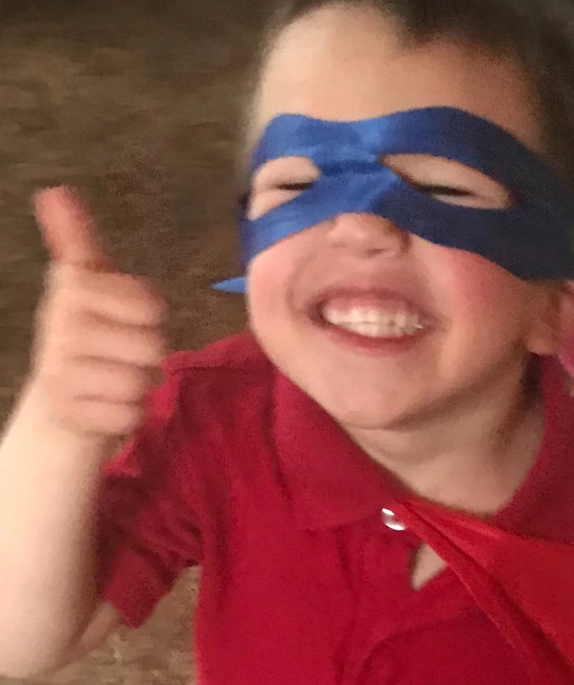 kaleb superhero smile.JPG