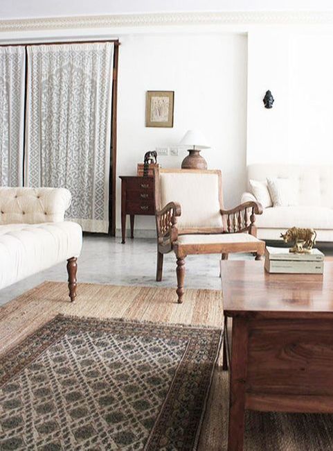 "This space was decorated with furniture sourced from Delhi or made in-house. Its tones and upholstery were made to match the existing wall color which could not be repainted." - Shivani