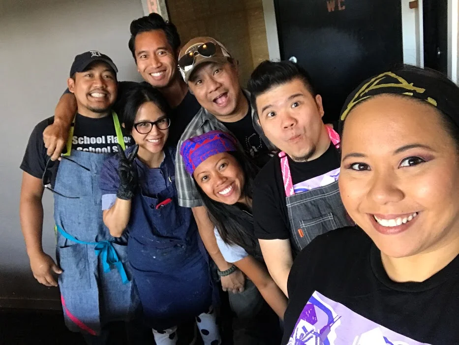 Portland, Oregon, September 2017. At the Bon Appetit Feast festival , Chef Carlo Lamagna (far left) with his cousin and sometime-prep cook Mel Lamagna of the soon-to-open Magna Restaurant , collaborated with chefs Isa Fabro of Los Angeles (next left), and (not pictured) Alvin Cailan of Eggslut Los Angeles on a Filipino Whiskey Pig dinner . Beloved Filipino American comedian Rex Navarette (center, sunglasses) joined us for a quick laugh break during prep. Left to right, we are Chef Carlo, Mel, Chef Isa, Rex, Sarahlynn, Sharwin, Natalia.