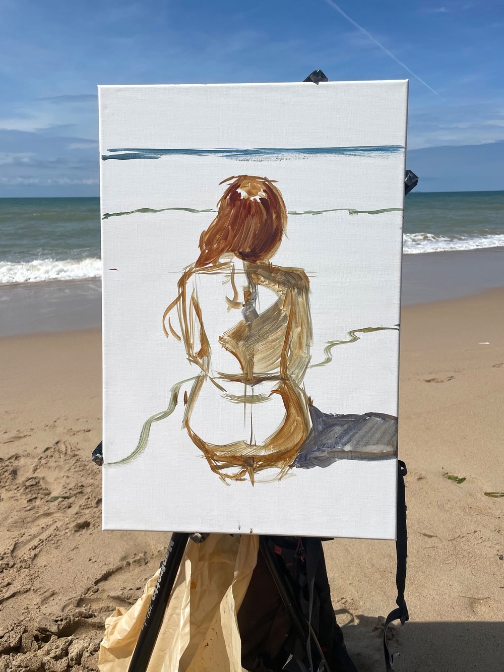 Start of a portrait of Marta kneeling in the surf. My one larger canvas of the trip