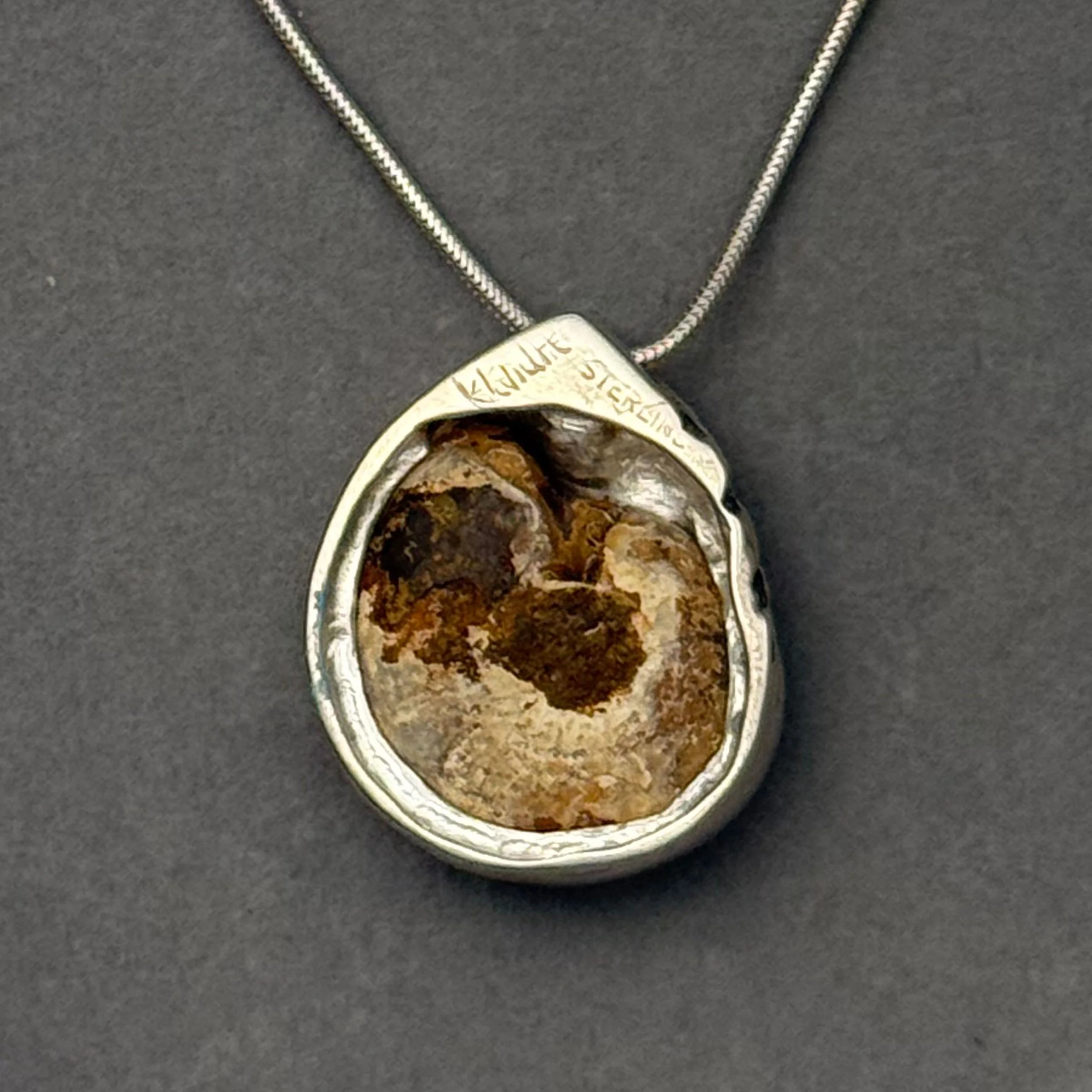 Ammonite-and-star-sapphire-back.jpg