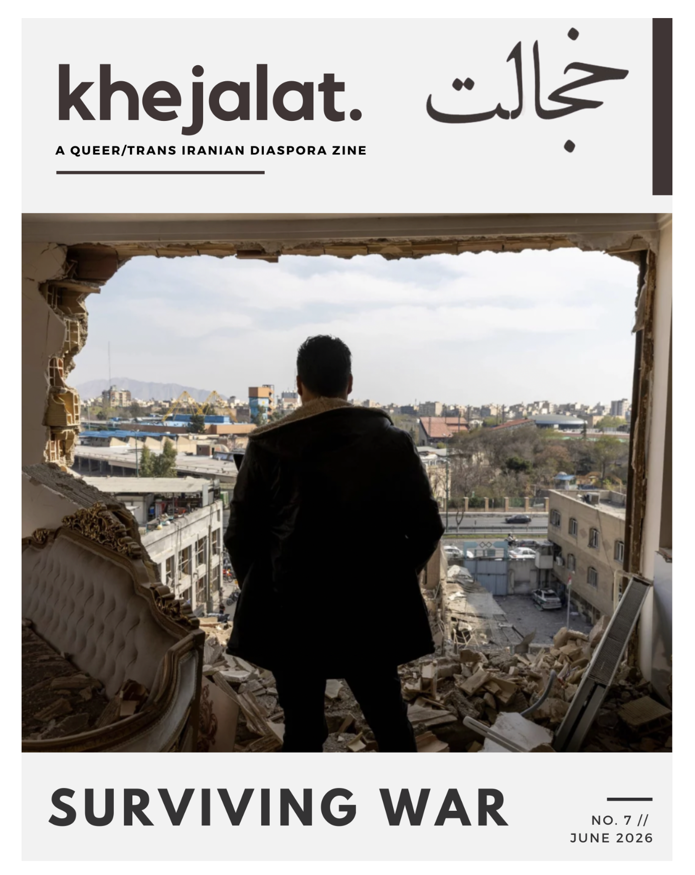 A man with his back turned to the camera, looks out at the bombed out wall of his home. The wall opens up into rubble strewn across a cityscape in Tehran, Iran