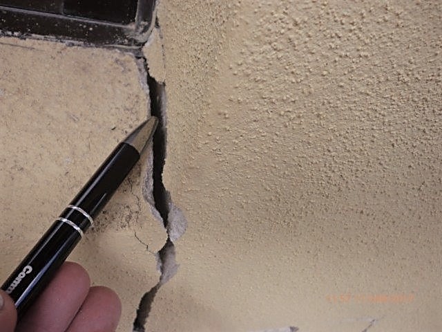 Large wall cracks due to seepage prior to foundation repair