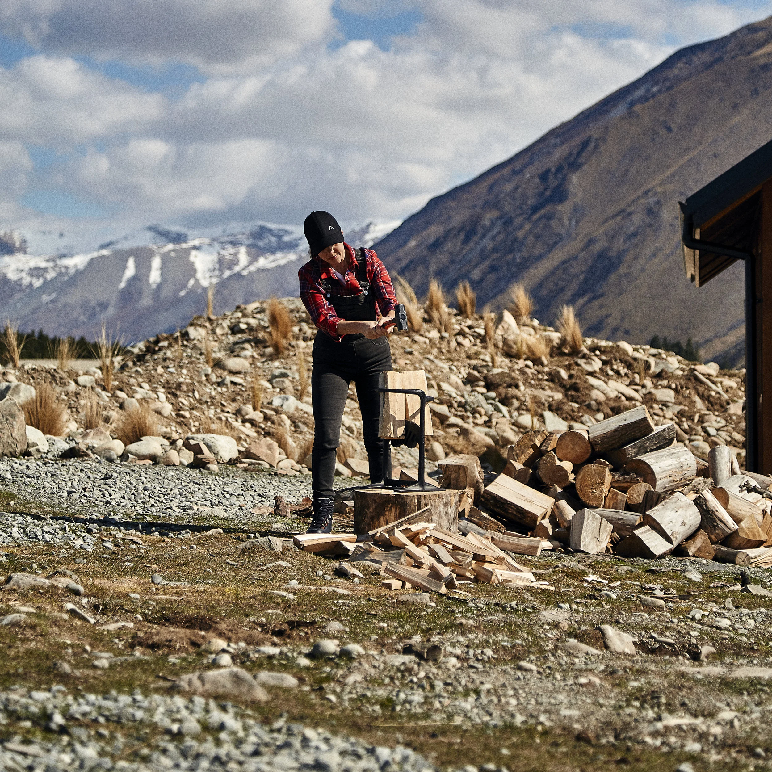 1.) Place firewood within frame and hit with hammer