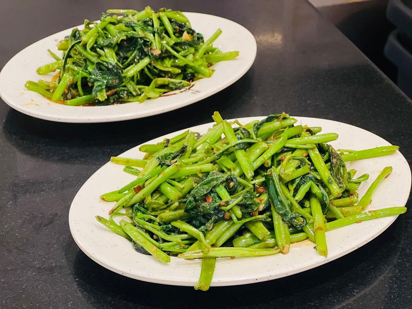 The vegetable with a gazillion names stir fried with belacan. 
Kang Kung - Morning Glory - Water Spinach - Ong Choi - Tong Choi. 
Whatever you call it, it's the most iconic Malaysian greens. 
Have you tried it ? 🤤