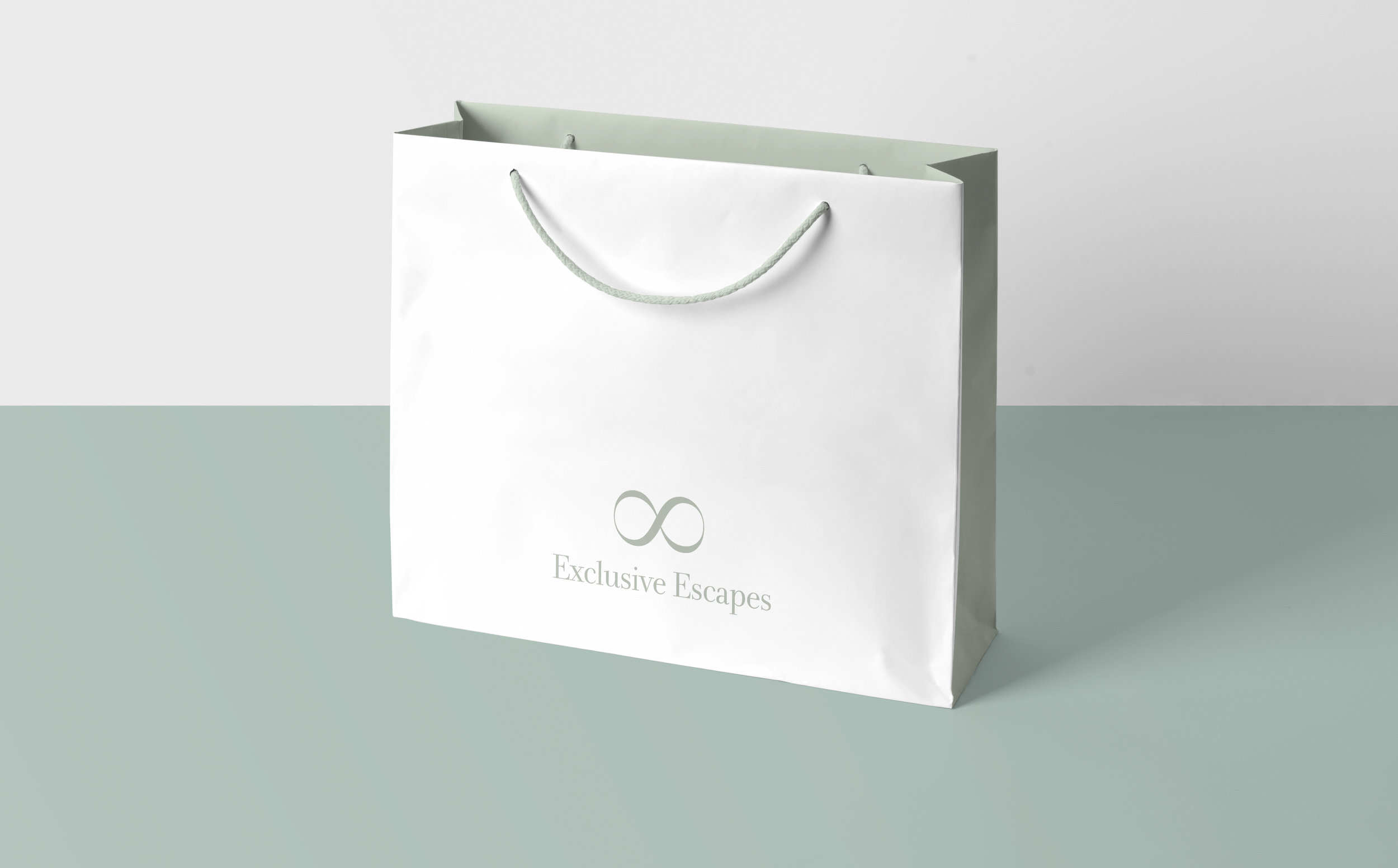 Exclusive Escapes Paper Bag.jpg