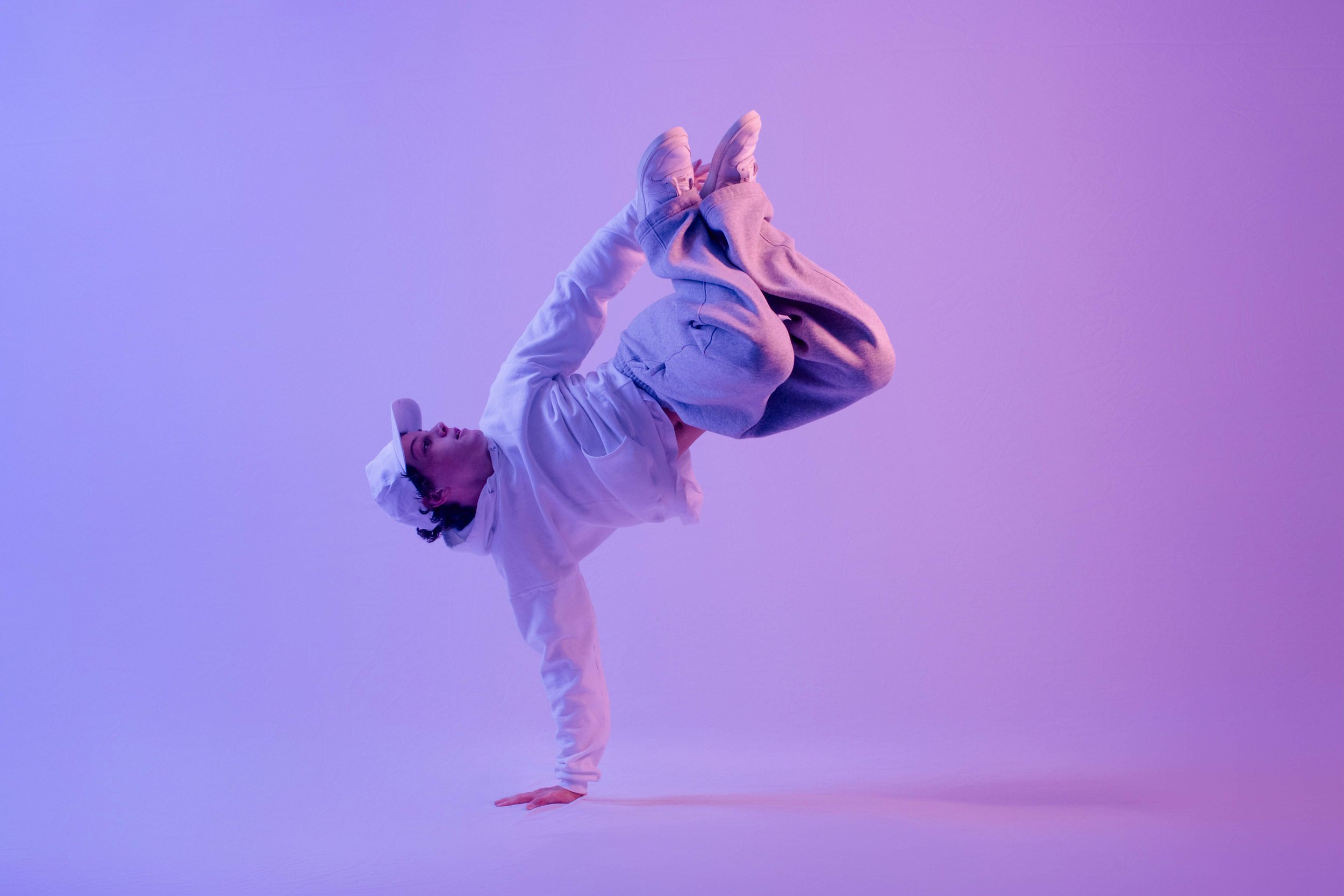 Color gel image of a break dancer in a powerful pose