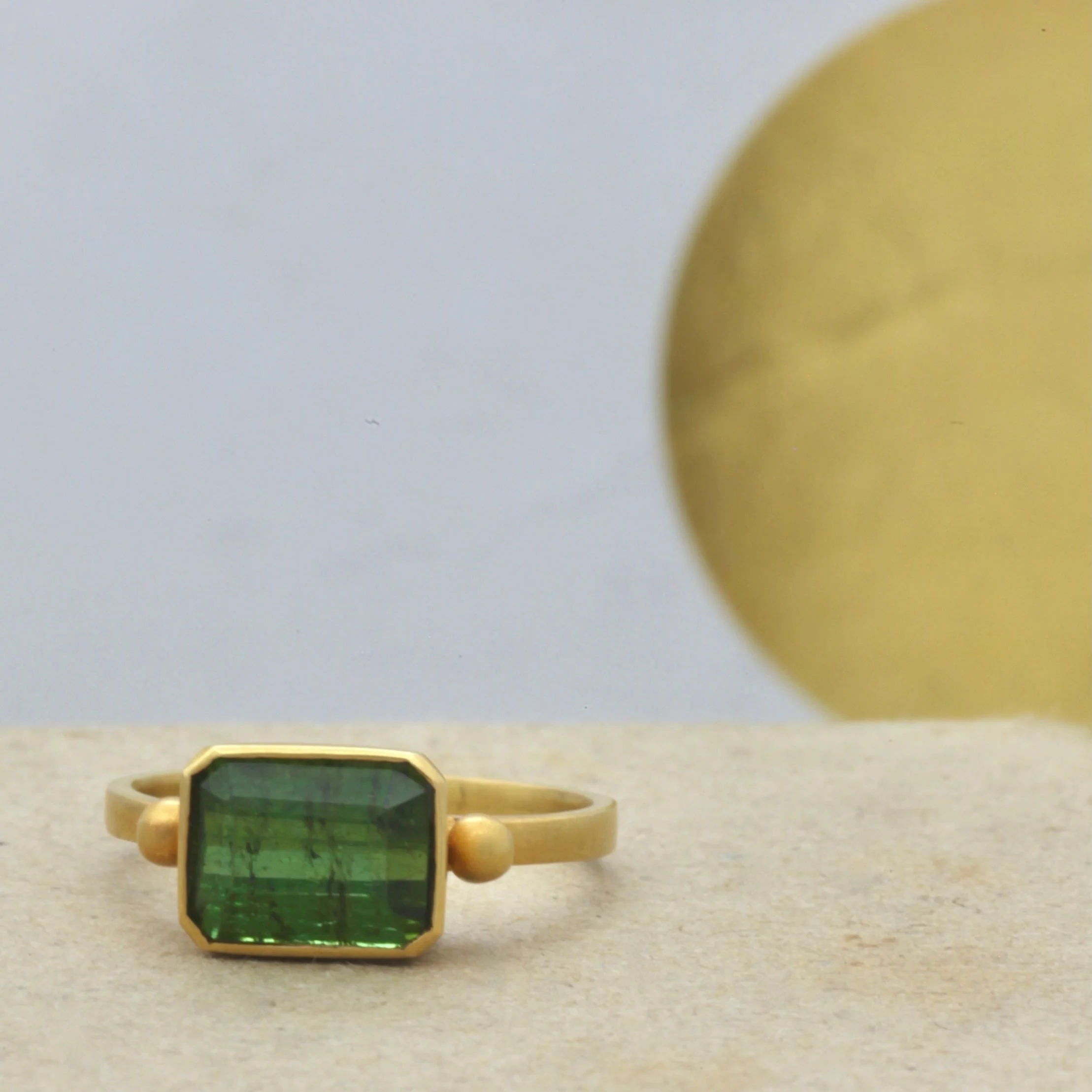 green+tourmaline+rectangle+2+dot+horizon++set+ringset+.jpg
