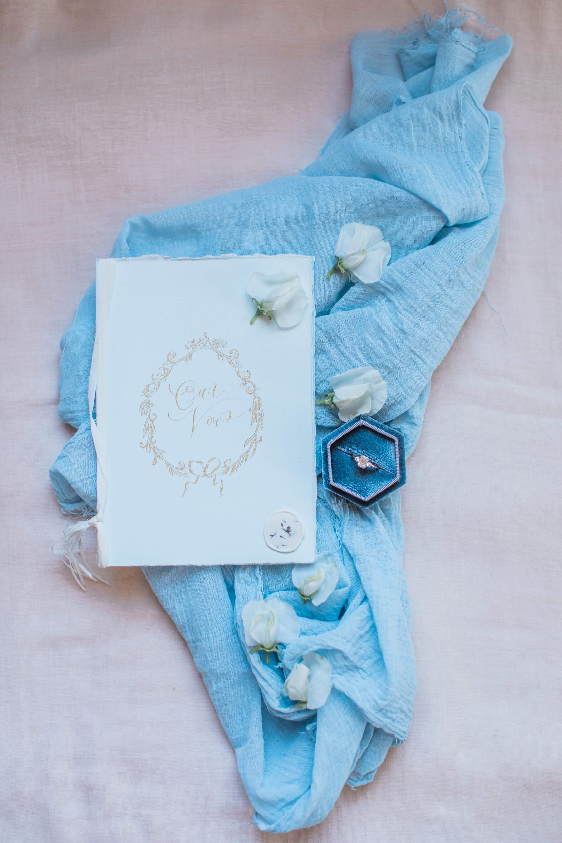 Hand drawn wreath and calligraphy vow book