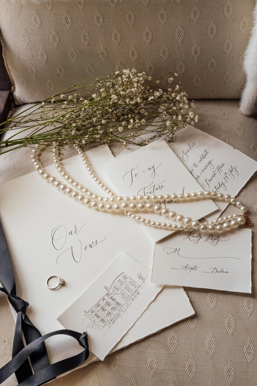 Bespoke wedding stationery suite with venue illustration and formal details