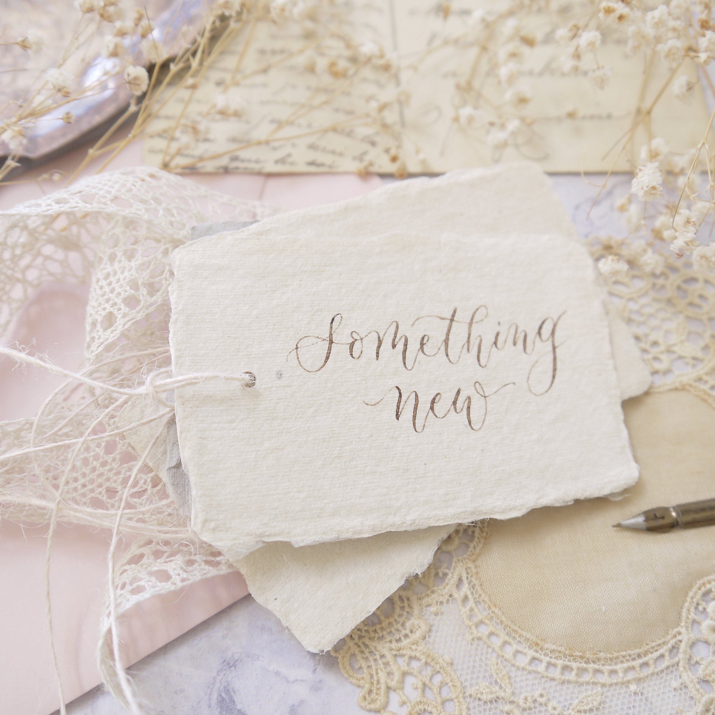 Personalised gift tag with calligraphy on handmade paper