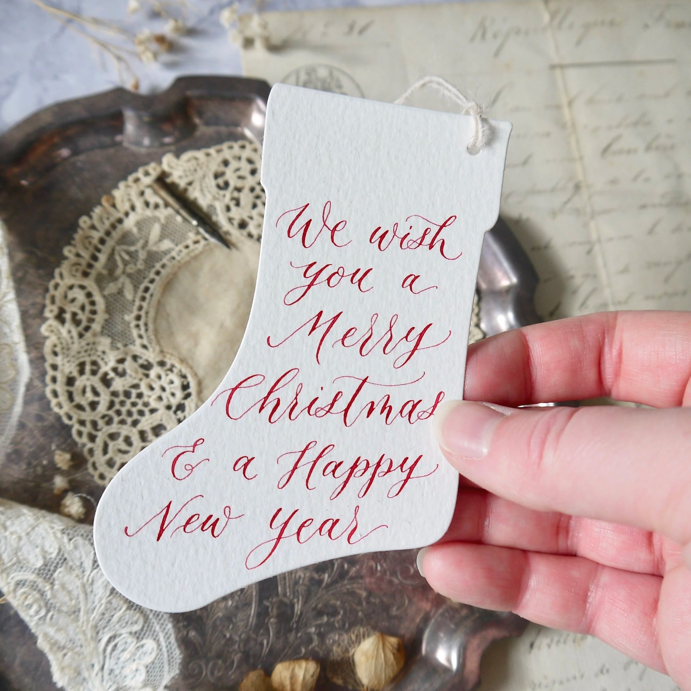 Christmas quote gift tag in calligraphy