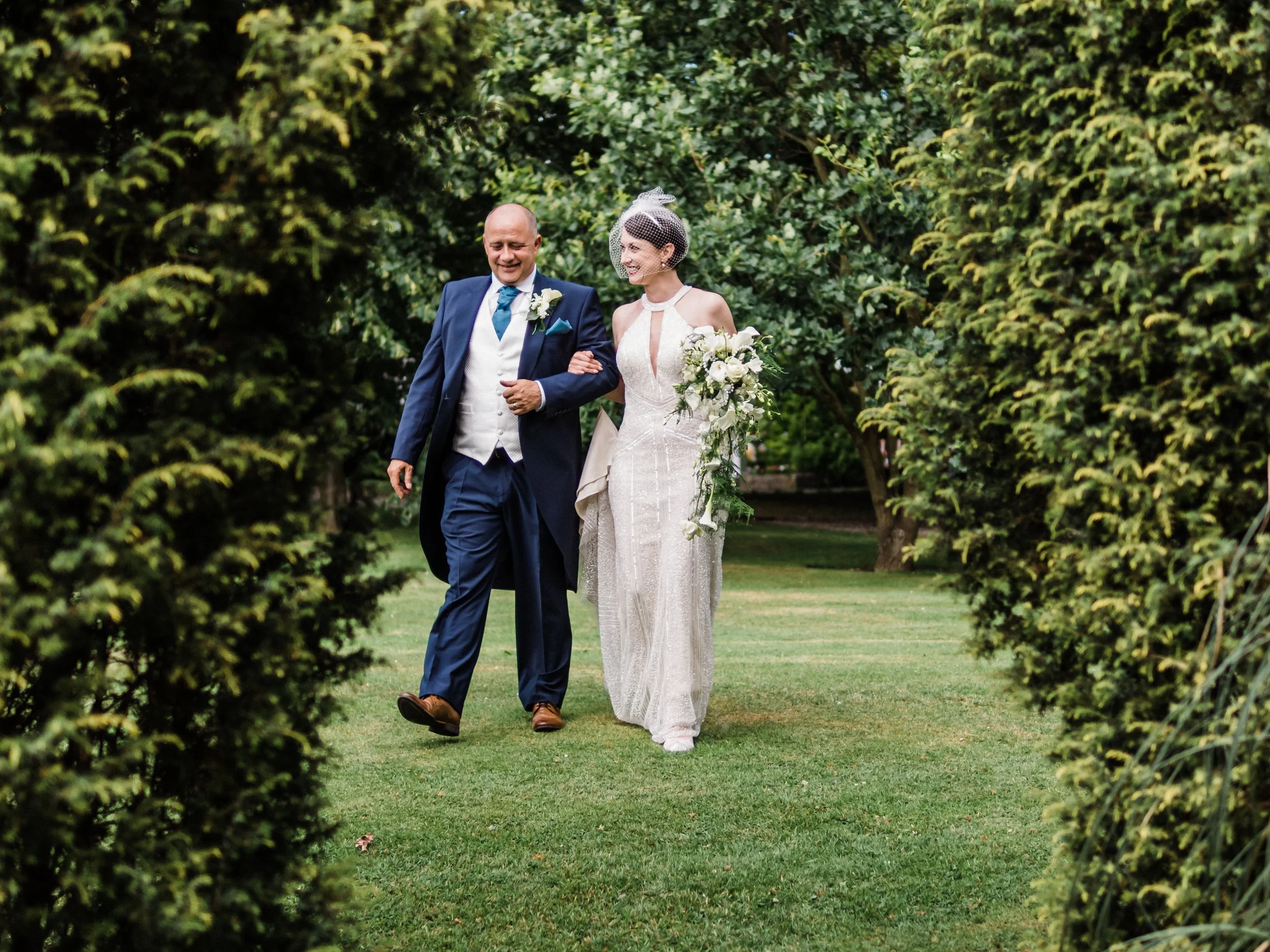 Deco inspired bride with her 1930's style wedding dress at Ringwood Hall in Derbyshire