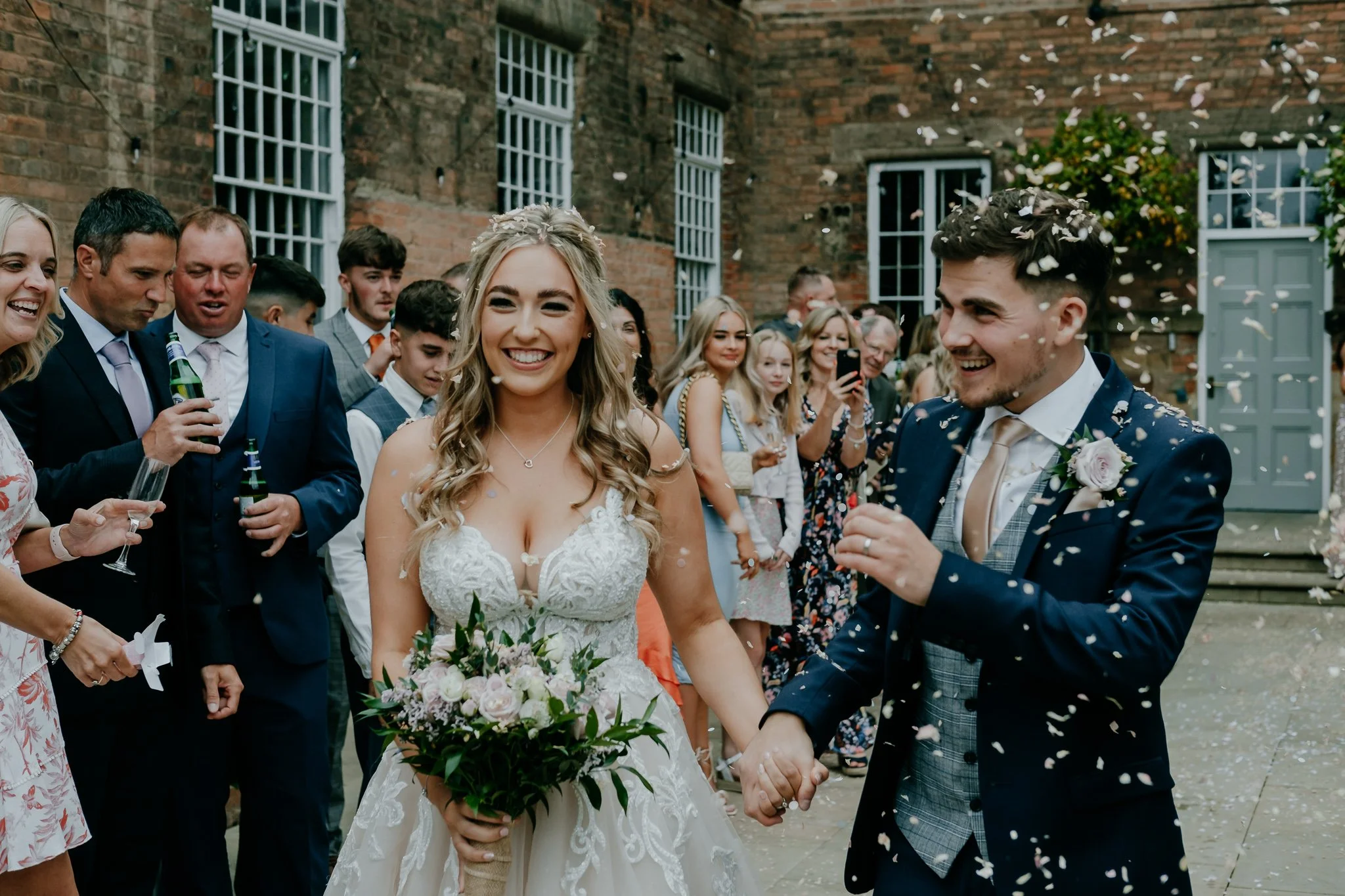 Confetti throw with the bride and groom at The West Mill in Derby