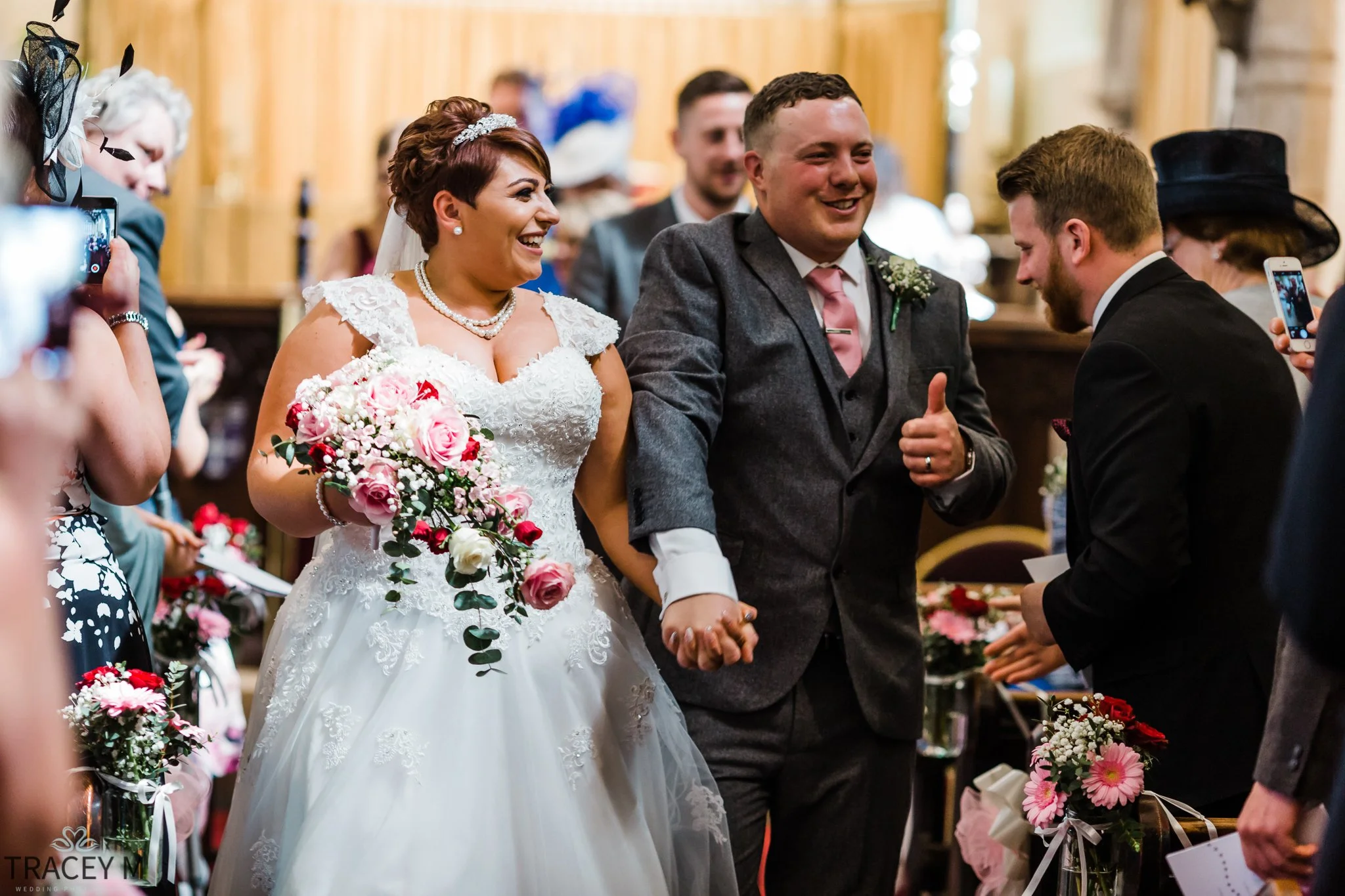 Bride and groom exiting church in Barlborough, Derbyshire