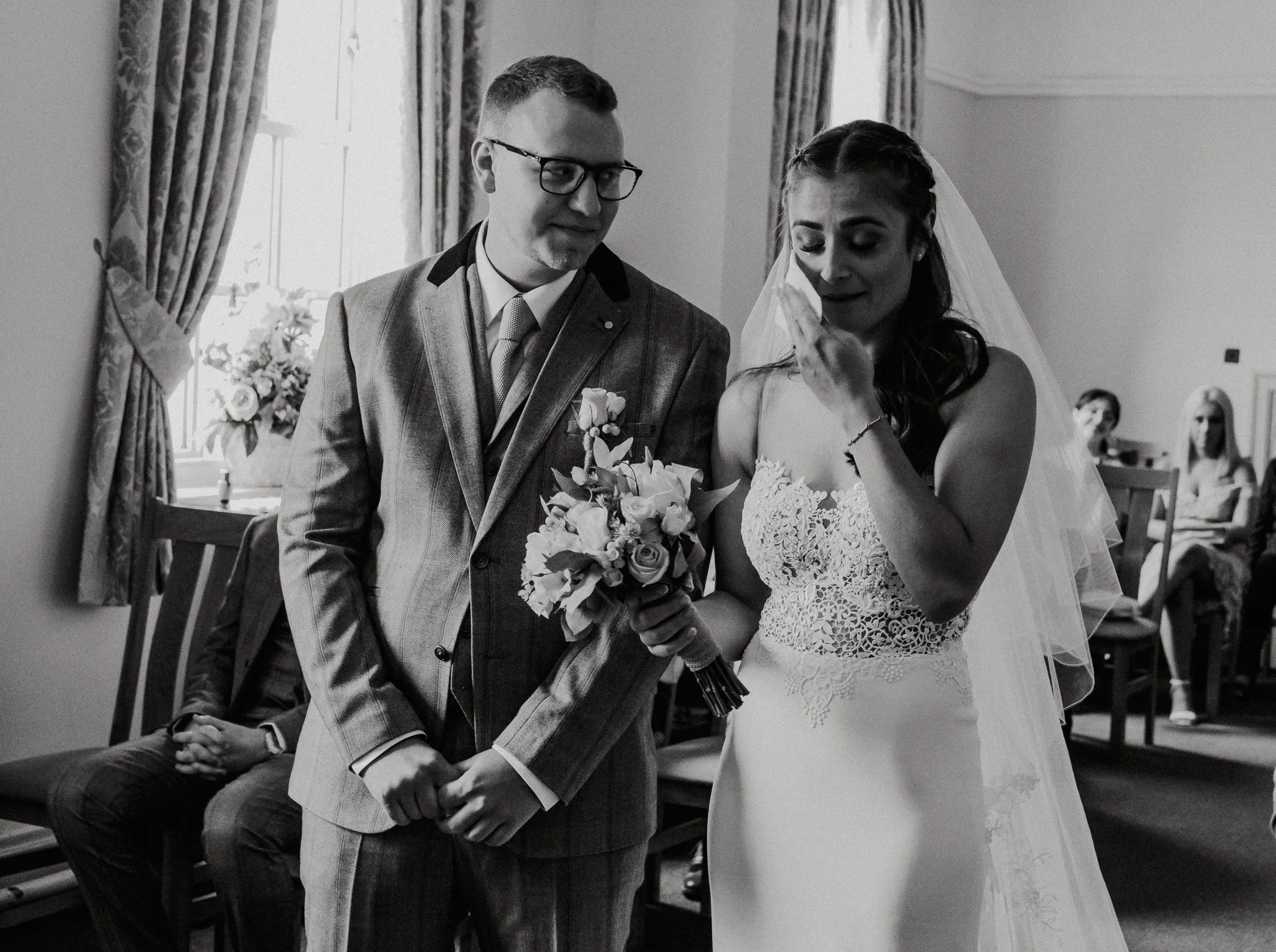 An emotional moment as bride walks up the aisle at Coalville Registry Office in Leicestershire
