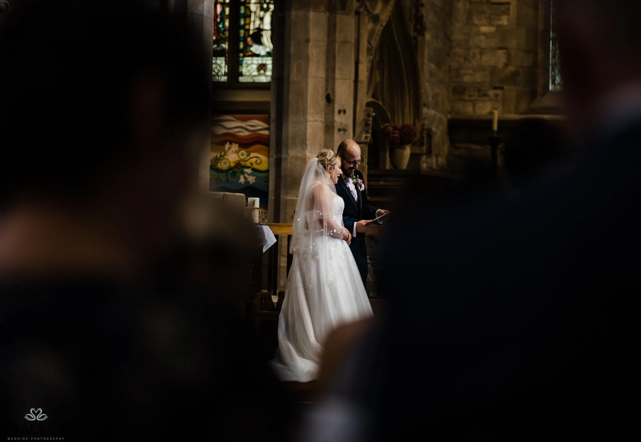 A wedding ceremony taking place at Hathersage Church in the Peak District