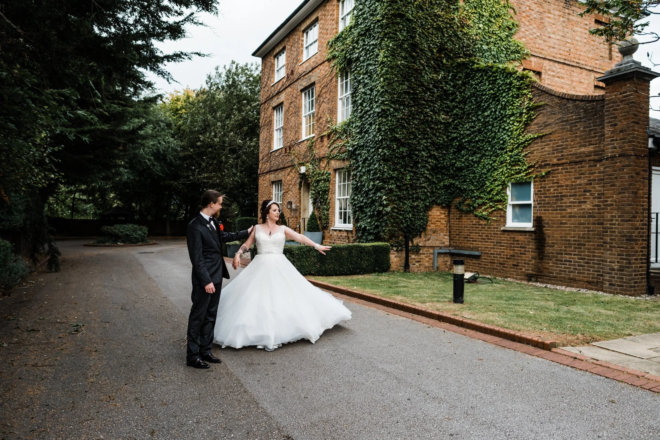 Su and Liam enjoying a relaxed moment together on their wedding day