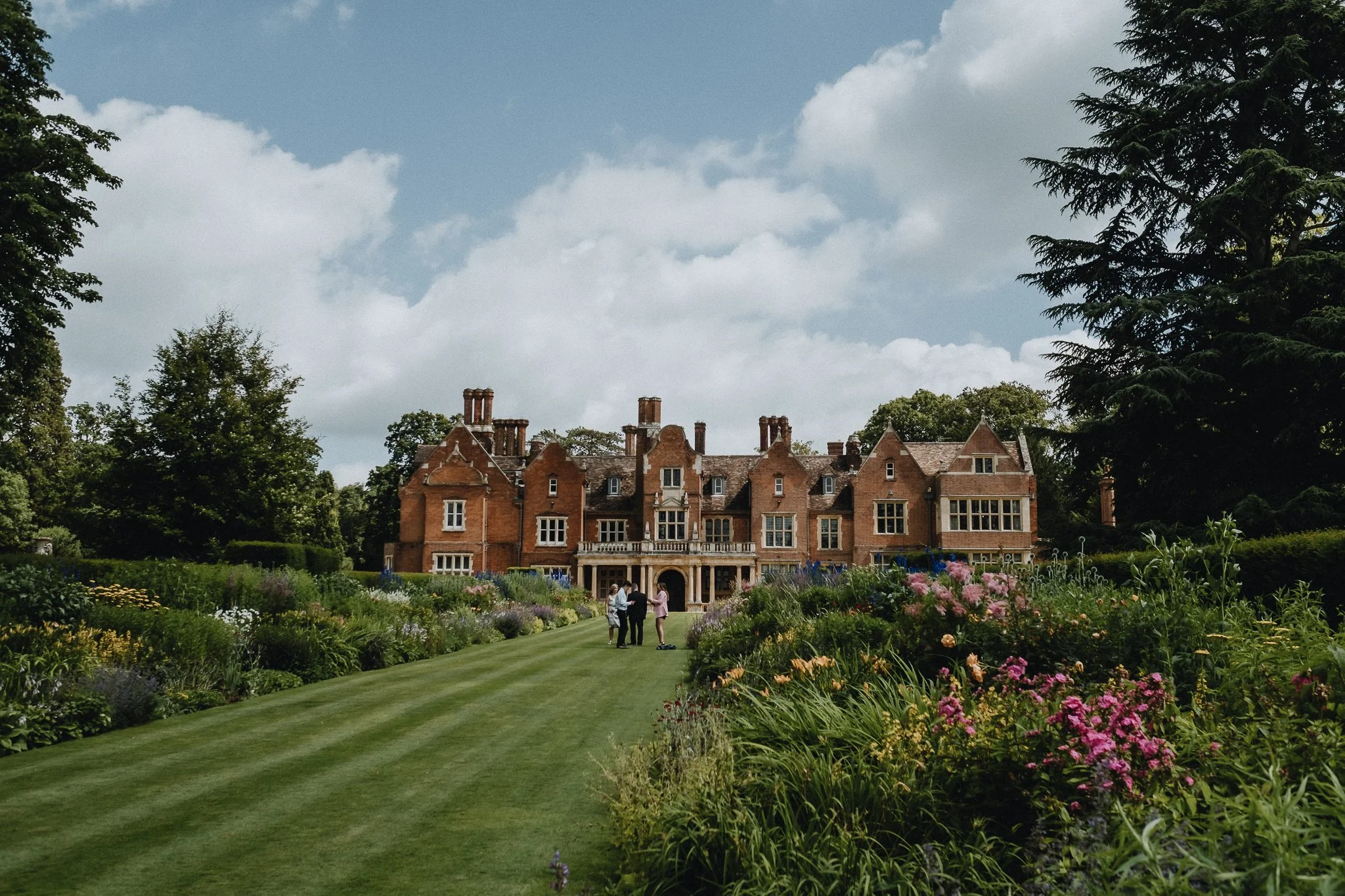 The exterior of Longstowe Hall on a summers day