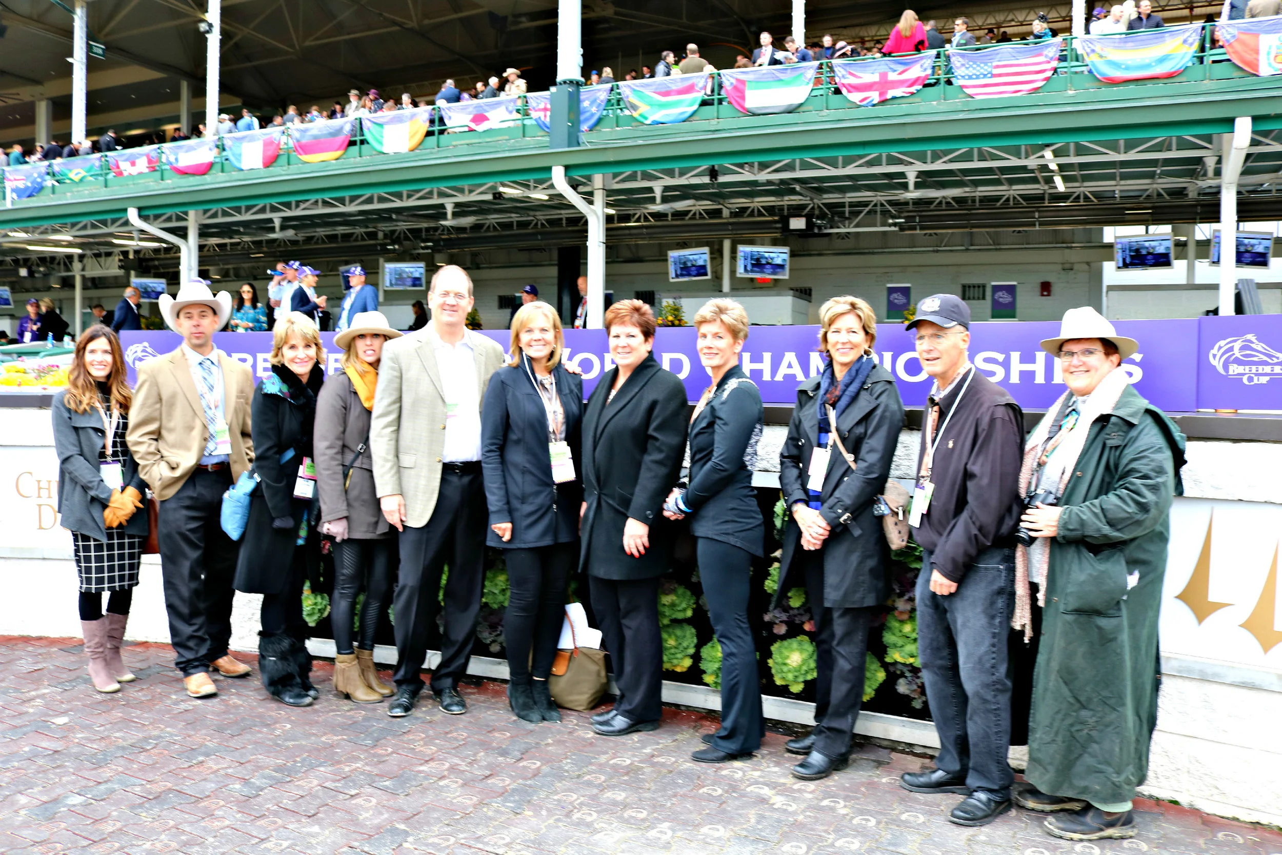 With the historic Twin Spires at Churchill Downs in Louisville, Ky., as the backdrop, family members of native Nebraskans and National Hall of Fame Horsemen – John A. Nerud , and father-and-son trainers, Marion and Jack Van Berg -- recently gathered in the Winner's Circle to represent the accomplishments of their patriarch descendants during the 35th running of the Breeders' Cup World Championships .