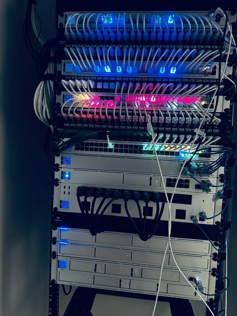 The same network rack after BBS rebuilt and labeled the cabling