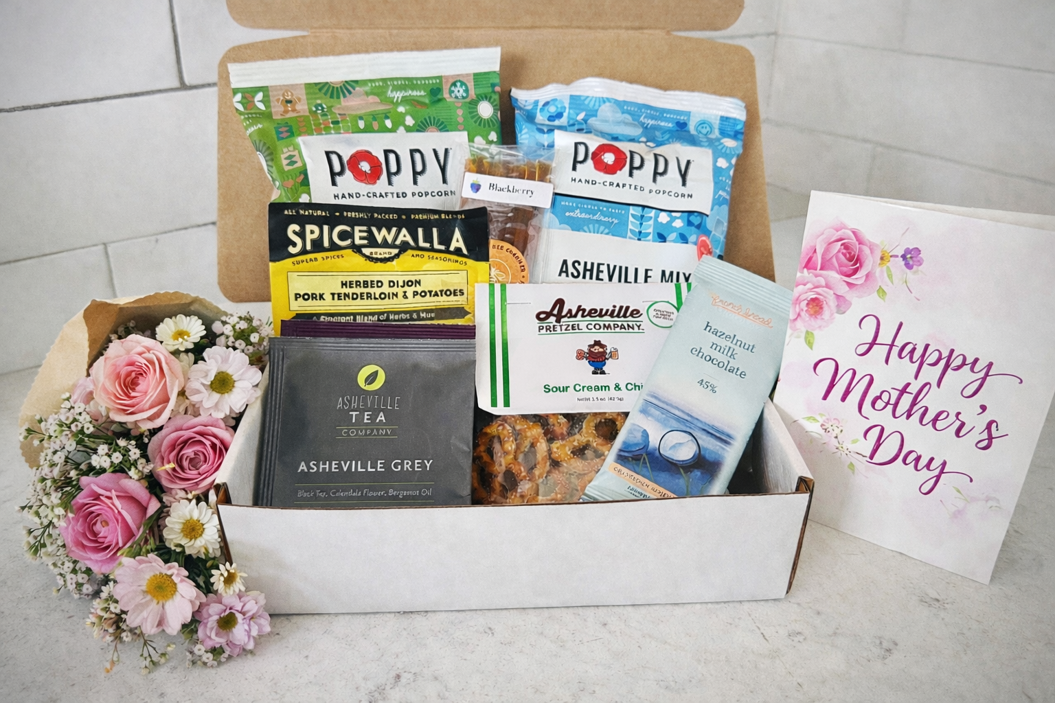 Mother's Day gift set and flowers.png