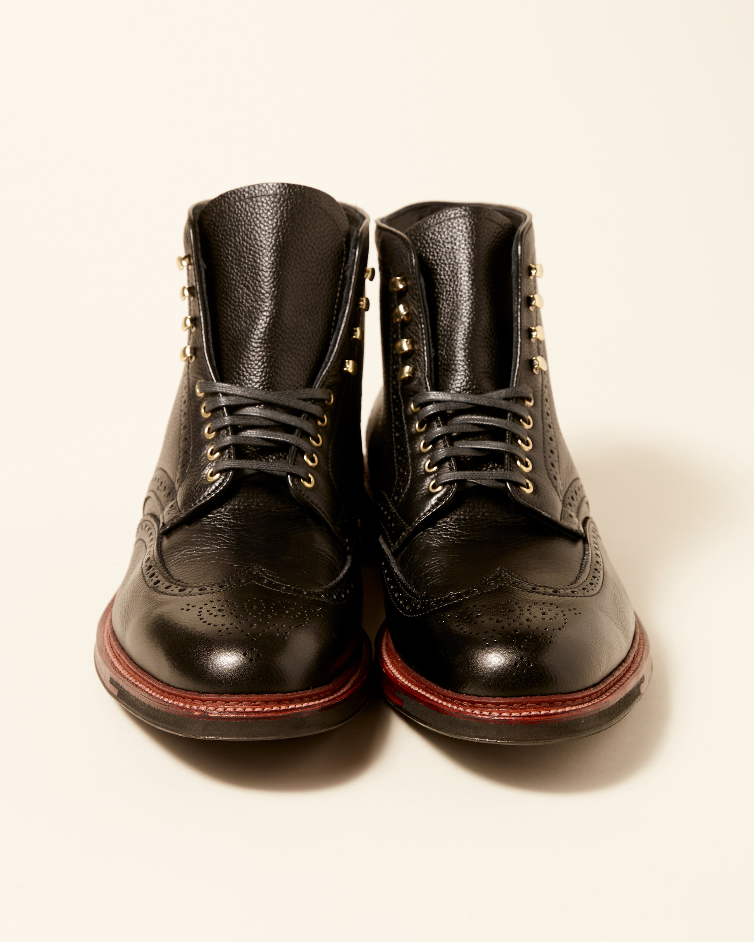black wingtip boots