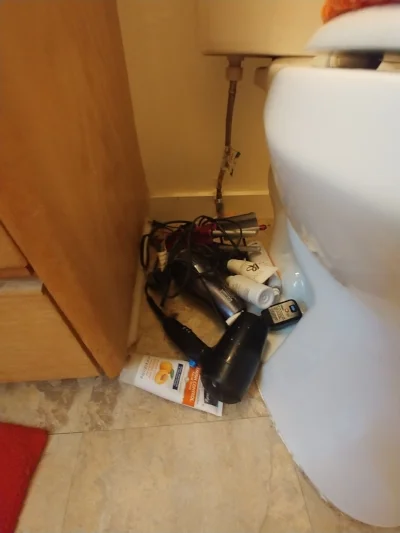 She took all my belongings in the bathroom and threw them by the toilet. 